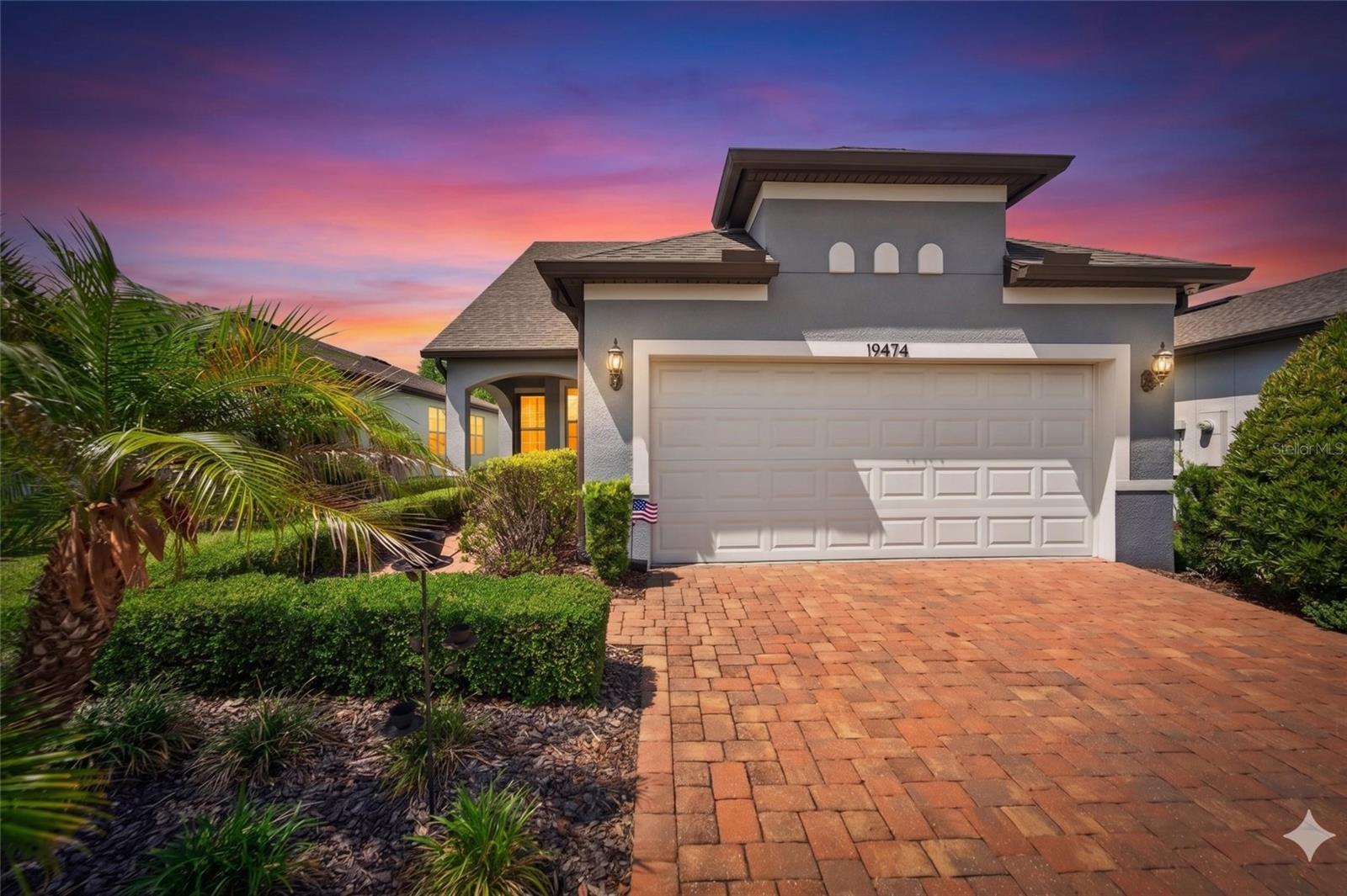 This is where your mornings start out - as you enjoy the Florida sunshine by your private pool, your evenings end with a glass of wine on the patio and your weekdays are filled with as much or as little as you choose. 19474 Ship Wheel Way is a rare find in the heart of Del Webb Bexley: a 3-bedroom, 3-bathroom, 2-car garage home with space for the life you've always pictured. With an extraordinary bonus of WHOLE HOME SOLAR — the solar panels will be PAID IN FULL at closing. That's right, from day one, your home will already be working for you!  Lower electric bills means money will be staying right where it belongs -  in your pocket. This home offers flexibility with 2 bedrooms and an office conveniently located on the main floor, where you'll enjoy the ease of your everyday routine. The primary suite is your private retreat overlooking a CONSERVATION VIEW and the dedicated office space means you can work from home, pursue hobbies or simply have a quiet space to call your own.  Then it gets interesting: Upstairs, a private third bedroom awaits your guests - complete with its own walk-in closet and an ensuite bathroom.  It's the perfect setup for family visits.  A word of friendly warning though: once the grandkids discover how comfortable it is up there in the LOFT and once the adults realize they have their very own suite with total privacy... your weekend guests may just forget to leave! Consider yourself warned and delighted!  Step outside and discover one of this home's most charming features: a private 9’ x 14’ SALT WATER Conversation POOL, perfectly sized for the Florida lifestyle you've been dreaming of!  This one is just right — big enough for the grandkids to splash around in during visits and intimate enough to feel like your own personal oasis the rest of the time.  Pour yourself a glass of wine, pull up a chair and let the Florida evening do the rest.  Living here you're joining one of the most celebrated 55+ communities in the Tampa Bay area.  Del Webb Bexley is home to 850 residences within a gated lifestyle community, centered around the stunning 19,000 sq ft Meridian Clubhouse. GOLF CART friendly!  Your HOA monthly dues cover cable, internet, and lawn maintenance, so your weekends are truly yours. The community amenities include a resort-style pool with lap lanes, hot tub, resistance pool, pickleball and tennis courts, bocce ball, a state-of-the-art fitness center, dog park, community garden and a full-time Lifestyle Director who keeps the social calendar buzzing year round. Whether you want to stay active, stay social, or simply stay relaxed - this community has it all! Del Webb Bexley is conveniently located near many top healthcare providers, yet tucked away from the hustle and bustle, is close to shopping and dining, including Tampa Premium Outlets, The Shops at Wiregrass, Citrus Park Mall and Tampa International Airport.