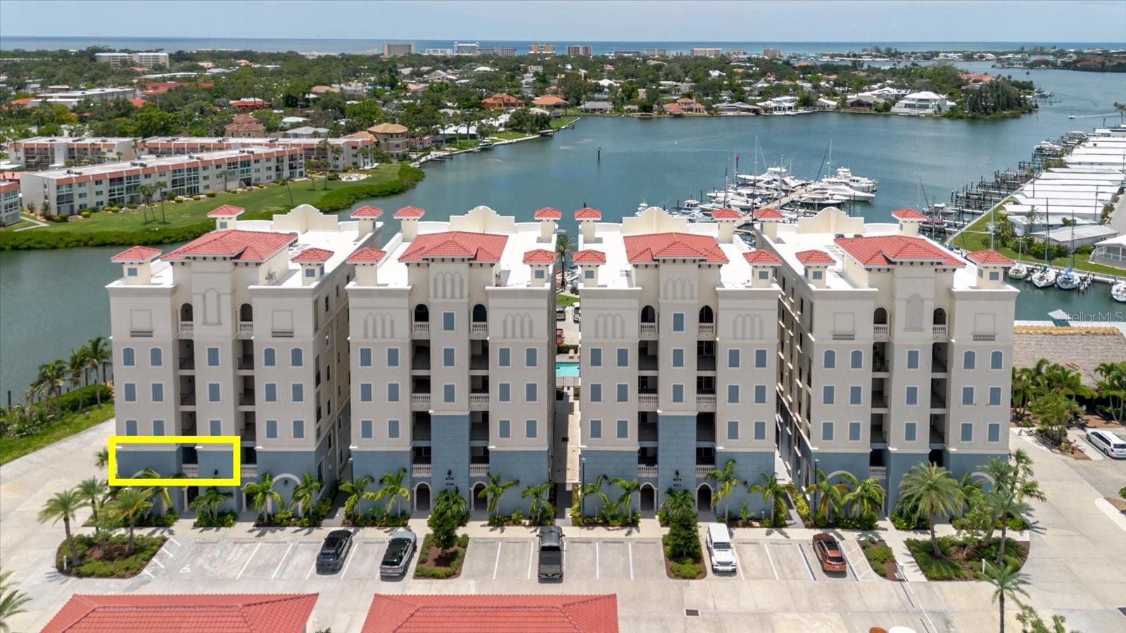 Premium waterfront living with unbeatable views—this is one of those Unique Opportunities you don’t want to miss. Perfectly positioned in the desirable Porto Vista community, this stunning 3-bedroom, 2-bath condo offers sweeping views of the Intracoastal to the south and Roberts Bay sunsets to the west—easily some of the best in the neighborhood.

This home blends coastal luxury with modern comfort. As you walk in, you’re greeted by floor-to-ceiling hurricane-impact windows that flood the space with natural light and frame those water views beautifully. Side windows are accented with plantation shutters, giving you both charm and privacy.

The kitchen is sleek and modern with quartz countertops, GE Café stainless steel appliances, Timberlake wood cabinets, and a custom built-in microwave. You’ll also find porcelain wood-look tile throughout, crown molding, and more quartz finishes in both bathrooms.

The spacious primary suite includes a tray ceiling and full bay views—imagine waking up to that every morning. There's room to entertain with two dining areas—a breakfast bar that seats four and a separate formal dining space. The screened front entry has been upgraded by the builder, and other features include custom electronic blinds, five ceiling fans, and a one-car garage just steps from the building entrance and elevator.

Porto Vista is a gated waterfront community with security cameras, controlled building access, and a heated pool with a community cabana. You’re just around the corner from Dockside Waterfront Grill and Fisherman’s Wharf Marina, where you can rent a boat, lease a slip, or jump into your next fishing or scuba adventure. Plus, you’re close to historic downtown Venice, Venice Beach, and the Legacy Trail.

It’s the coastal lifestyle you’ve been dreaming of—move-in ready and loaded with style.