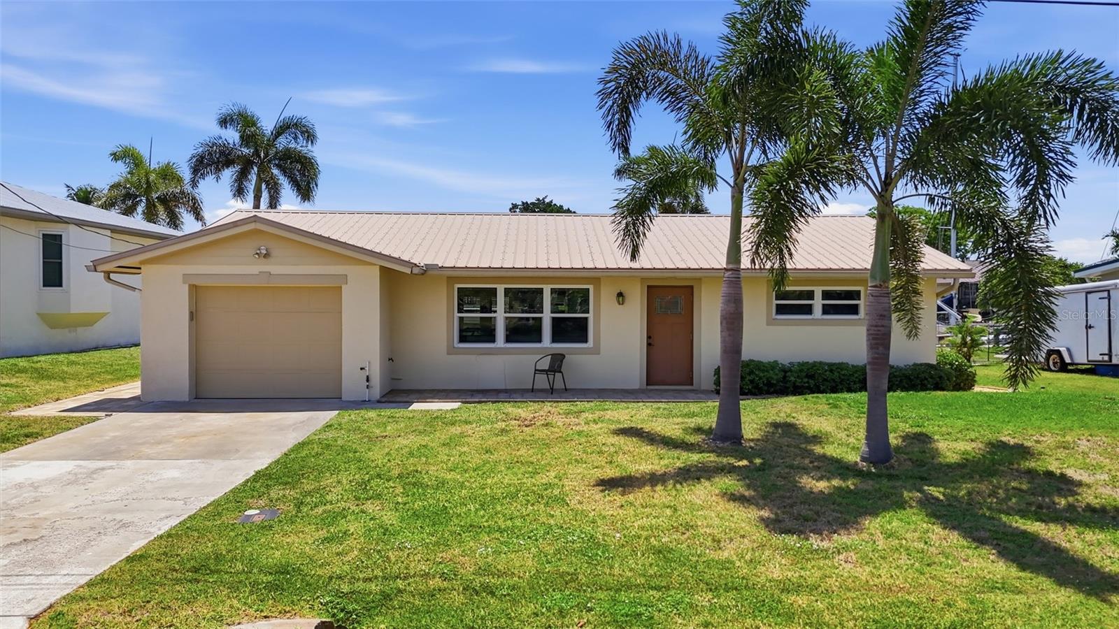SAILBOAT ACCESS WATERFRONT HOME IN PUNTA GORDA | 75 FEET OF CANAL FRONTAGE WITH PRIVATE DOCK & BOAT LIFT!

Experience the Florida boating lifestyle from this beautifully maintained 2 bedroom, 2 bathroom waterfront home offering sailboat access and 75 feet of canal frontage. Complete with a private 16' x 6' dock and 8,500-lb boat lift, this property provides quick access to Charlotte Harbor and beyond. Inside, a bright open floor plan, beautiful water views, and inviting living spaces create the perfect setting for both everyday living and entertaining. Thoughtfully updated with impact windows, a new A/C in 2025, flood protection features, and numerous exterior improvements, this home is ready to enjoy. Whether you're relaxing in the Florida room or heading out on the water, this property delivers the best of Punta Gorda waterfront living.

INTERIOR FEATURES

• 2 bedrooms, 2 bathrooms
• 1-car garage
• Bright and open floor plan
• Tile flooring throughout the main living areas
• Beautiful canal views
• Spacious living and dining areas
• Designed for comfortable everyday living and entertaining
• Abundant natural light throughout
• Impact windows throughout
• Custom wood blinds
• New A/C (2025)
• Recently painted interior

KITCHEN FEATURES

• Eat-in kitchen
• Stainless steel appliances
• Quartz countertops
• Breakfast bar seating
• Ample cabinet and counter space
• Open layout overlooking the main living areas
• Functional design for entertaining

PRIMARY SUITE

• Spacious primary bedroom
• Canal views
• Walk-in closet
• En-suite bathroom
• Single-sink vanity
• Walk-in shower
• Private waterfront retreat

GUEST ACCOMMODATIONS

• Guest bedroom with built-in closet
• Guest bathroom located separately from the primary suite for added privacy
• Convenient access from the laundry room and main living areas
• Comfortable space for family and visitors

FLORIDA LIVING FEATURES

• Florida room with beautiful canal views
• Double-insulated windows in Florida room
• Fabric hurricane panels for added storm protection
• Expanded indoor living and entertaining space
• Outdoor patio ideal for grilling and additional seating
• Relaxing waterfront setting
• Perfect for enjoying Southwest Florida's year-round sunshine

WATERFRONT FEATURES

• Sailboat-access canal
• 75 feet of waterfront frontage
• Private 16' x 6' dock
• 8,500-lb boat lift
• Direct access to Charlotte Harbor and the Gulf of Mexico from Alligator Creek
• Excellent boating and fishing opportunities
• Cast a line or launch your next adventure from your backyard

EXTERIOR & IMPROVEMENTS

• Flood gates for garage door
• Flood gates for front and rear entry doors
• Updated landscape curbing
• Paver walkways and outdoor accents
• Newer gutters
• Recently painted exterior
• Well-maintained waterfront property

LOCATION HIGHLIGHTS

• Located in desirable Punta Gorda
• Convenient access to boating, fishing, and waterfront recreation
• Close to shopping, dining, and everyday conveniences
• Near Fishermen's Village
• Easy access to parks, golf courses, and local attractions
• Short drive to Gulf beaches

Whether you're searching for a seasonal getaway, waterfront investment property, or full-time residence, this sailboat-access home offers the perfect combination of comfort, convenience, peace of mind, and boating access in one of Punta Gorda's most sought-after waterfront settings. Schedule your private showing today!
