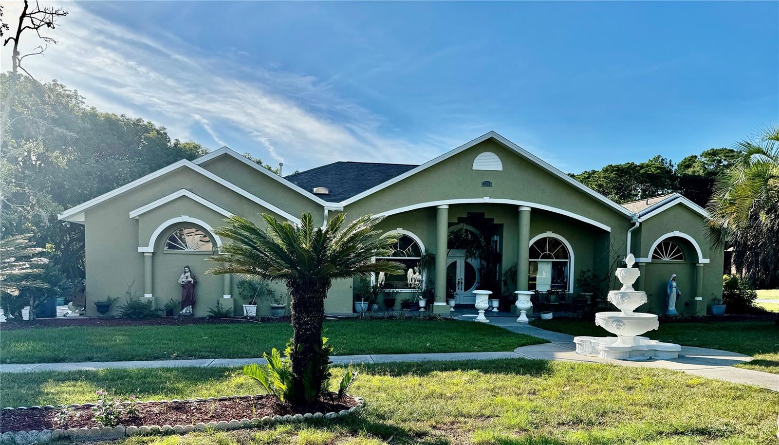 Turn-Key Executive Estate in Guard-Gated Lake In The Woods
Check this updated custom estate on an oversized lot in Lake In The Woods. Spanning 2,744 square feet, county records show an effective date of 2002. This move-in-ready home offers 24-hour guard-gated security, fresh 2026 exterior paint, neat landscaping, and an accent waterfall.
The layout features a formal living room and a formal dining room with high tray ceilings and sliders to the pool. enjoy Separated dining area and a family room with custom recessed cabinets, accent shelving, and high windows.
The pristine chef’s kitchen features new stainless steel appliances, custom cabinetry with slide-out shelves, and two-tiered cutlery trays. It boasts granite countertops and a sprawling breakfast bar that overlooks the family spaces and patio.
The crown jewel is the luxury executive suite wing. It includes a massive flex room with an accent window—perfect for a luxurious walk-in closet, nursery, or office. The spa-like master bath features a deep jacuzzi tub, dual vanities, a standalone shower, and elegant floor-to-ceiling tiling in bathrooms.
On the other side of the home, the remaining bedrooms have tile flooring and bright windows. The extra full bathrooms also showcase beautiful floor-to-ceiling tiling. All blinds and window treatments stay with the house.
Sliding glass doors lead to a screened lanai with a sparkling in-ground pool and an integrated inground jacuzzi spa. The full summer kitchen comes equipped with a sink, stove, and counter space.
For utility, the 2-car garage has durable tiled flooring and leads into a large laundry room with built-in cupboards. The home also offers a generous, double-door storage area perfect for gear or a workshop.
Lake In The Woods residents enjoy premium amenities like tennis courts, a dog park, and a scenic lake for kayaking or fishing. Located just minutes from shopping, dining, and top schools, this turn-key estate stands in a class of its own. Schedule your private tour today!