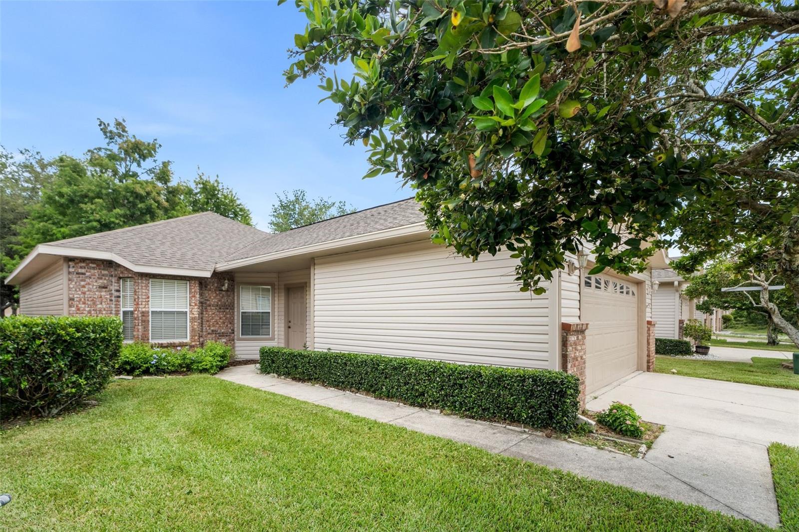 Virtually Staged. Welcome home to this beautifully maintained 3-bedroom, 2 bath patio home nestled in the highly desirable Blues Creek community. Offering the perfect blend of comfort, convenience, and low-maintenance living. This move in ready residence is ideally located near shopping, dining, and provides an easy commute to nearby hospitals and Gainesville amenities. Enjoy carefree ownership with the HOA handling exterior maintenance, including roof replacement, exterior painting, and yard care, allowing more time to relax and enjoy the community pool and tennis courts. Inside you'll find thoughtful upgrades throughout, including rich hardwood flooring, elegant crown moldings, and updated appliances. The home also features a newer A/C system installed in 2022 for an added peace of mind.