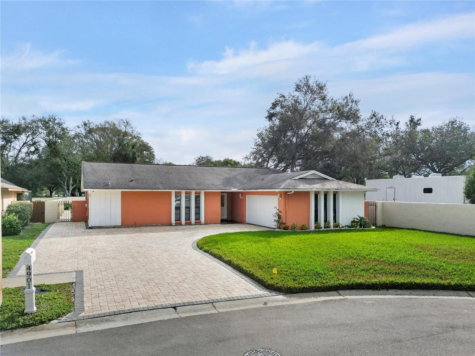 This POOL HOME is a MUST SEE!!! 1656sqft+ STUNNINGLY BEAUTIFUL 3 Bedrooms, 2 Full Baths , RENOVATED!! FRESHLY PAINTED! Fully PAVED entrance and backyard!!! OPEN floor plan. Spacious Living room and Florida Room. MOVE-IN READY. MASTER ROOM SUITE!!! PORCELAIN Tiles! PLUS, it comes with a backyard paradise. FULLY Fenced NO HOA. NO CDD LOCATION!! LOCATION!! Plus just minutes away from Tampa International Airport, Downtown Tampa, Beaches, Shopping Malls, Restaurants!! Schedule your showing today!!!