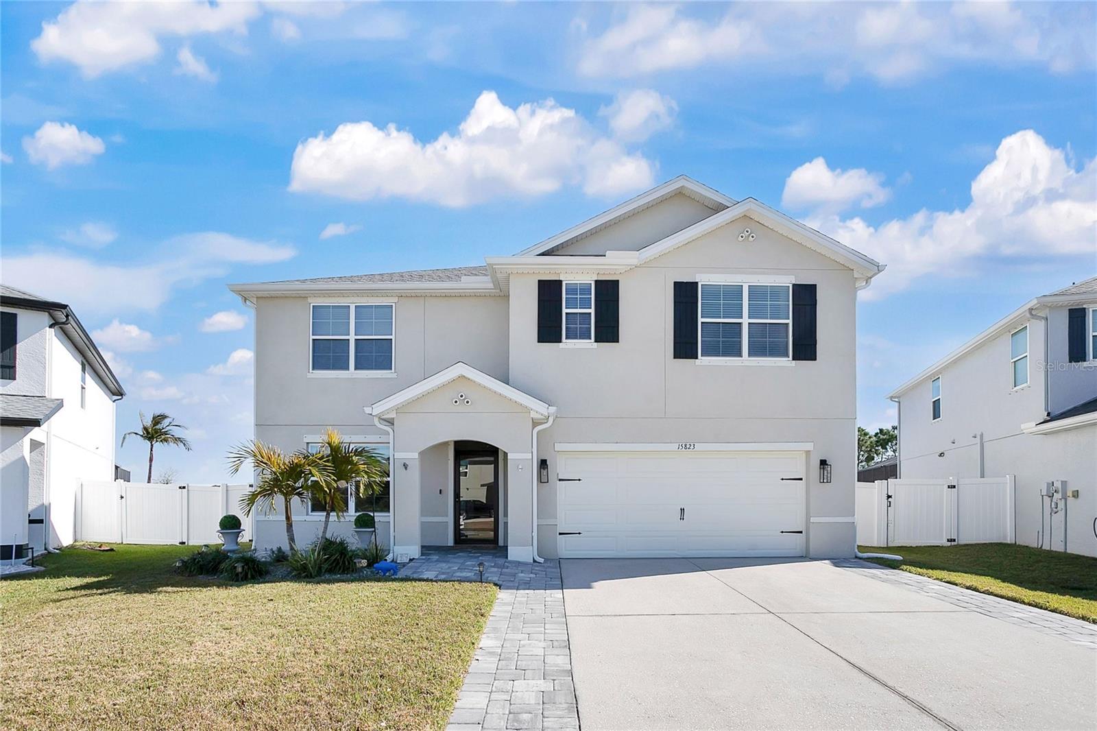 Discover a home designed for the way families truly live. This spacious 5-bedroom, 3-bath residence offers 2,601 sq. ft. of inviting, functional living space—complete with a sparkling pool, relaxing spa, and a large, fenced backyard ideal for gatherings, playtime, and everyday enjoyment. Built in 2017 with a new roof in 2024, this home delivers peace of mind along with incredible affordability thanks to a low HOA and no CDD fees.

Inside, the open-concept layout creates a natural hub for family connection and entertaining. The kitchen features stainless steel appliances, and a generous island that brings everyone together. Light-filled living and dining areas flow effortlessly to the covered lanai, making indoor-outdoor living a breeze.

A first-floor bedroom and full bath afford flexibility for guests, multigenerational living, or a home office. Upstairs, the private primary suite provides a peaceful retreat with a walk-in closet and spa-inspired bath. Three additional bedrooms and a versatile loft give families room to grow, relax, and create.

Located in the gated community of Del Tierra, residents enjoy resort-style amenities including a pool, fitness center, playground, and scenic walking trails—all close to top-rated schools, shopping, dining, and the Gulf Coast’s beautiful beaches.

Move-in ready, family-friendly, and priced with value in mind—this home checks all the boxes.