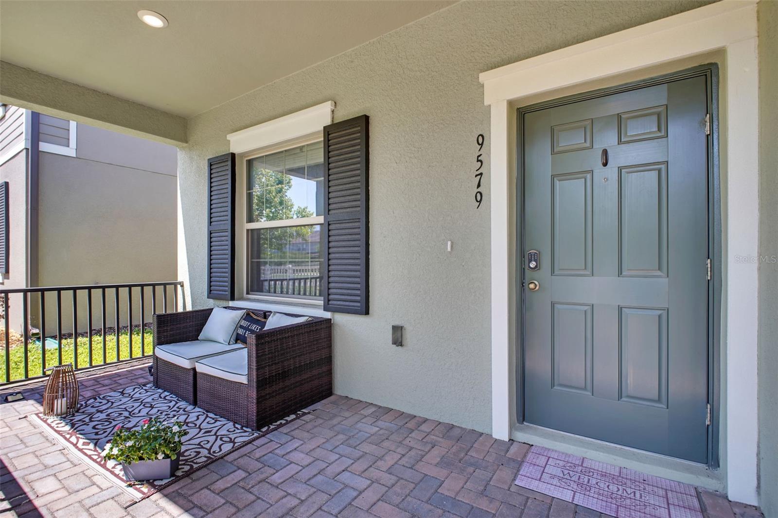 Welcome to 9579 Flourish Dr, Land O’ Lakes, FL 34637 — a beautifully maintained, move-in-ready 3-bedroom, 2-bathroom home with a 2-car garage located in the highly sought-after Connerton Village community. Built in 2021 and offering 1,627 square feet of thoughtfully designed living space, this modern one-story home combines comfort, functionality, and the incredible Florida lifestyle buyers are searching for in today’s market.

The seller has strategically priced this property based on current market conditions and the excellent condition of the home, creating an outstanding opportunity for buyers seeking value in the Land O’ Lakes real estate market.

Inside, you’ll find a bright and open-concept floor plan featuring tile flooring throughout the main living areas and plush carpeting in the bedrooms for added comfort. The spacious kitchen overlooks the living and dining areas, creating the perfect setup for entertaining, relaxing, or everyday living. This home is truly ready for immediate move-in and has been exceptionally cared for.

Additional interior highlights include a dedicated laundry room with added cabinetry for extra storage and organization, a spacious primary suite, and a functional split-bedroom layout designed for privacy and convenience.

Step outside and enjoy upgraded outdoor spaces designed to embrace the Florida lifestyle. The front yard features upgraded landscaping, sod, a vinyl fence, and a brick paver patio area perfect for morning coffee or evening gatherings. In the rear, enjoy a covered lanai, a brick paver driveway, and a spacious 2-car garage complete with attic access for additional storage. The irrigation system helps maintain lush landscaping year-round.

Connerton Village is one of Pasco County’s premier master-planned communities, surrounded by approximately 4,800 acres of preserved wetlands and natural beauty. Residents enjoy access to Club Connerton, a stunning 10,000-square-foot clubhouse featuring a resort-style pool, lap pool, splash park, state-of-the-art fitness center, café, and community gathering spaces.

Outdoor enthusiasts will appreciate miles of scenic walking and biking trails, playgrounds, dog parks, basketball courts, tennis courts, pickleball courts, and an open-air amphitheater hosting community events, movie nights, and live entertainment. A full-time lifestyle director keeps the community calendar active year-round with events including Food Truck Fridays, yoga classes, holiday celebrations, and more.

Nature lovers will also appreciate nearby Conner Preserve, a nearly 3,000-acre protected wildlife habitat showcasing Florida’s natural beauty through scenic trails, marshes, pine flatwoods, and wildlife viewing opportunities.

Conveniently located near Connerton Elementary School, highly rated International Baccalaureate middle and high schools, shopping, dining, and the community Publix plaza, this home offers the perfect blend of convenience, lifestyle, and long-term value.

If you are searching for a move-in-ready home in Land O’ Lakes with modern finishes, resort-style amenities, and exceptional community features, 9579 Flourish Dr is a must-see. Schedule your private showing today.