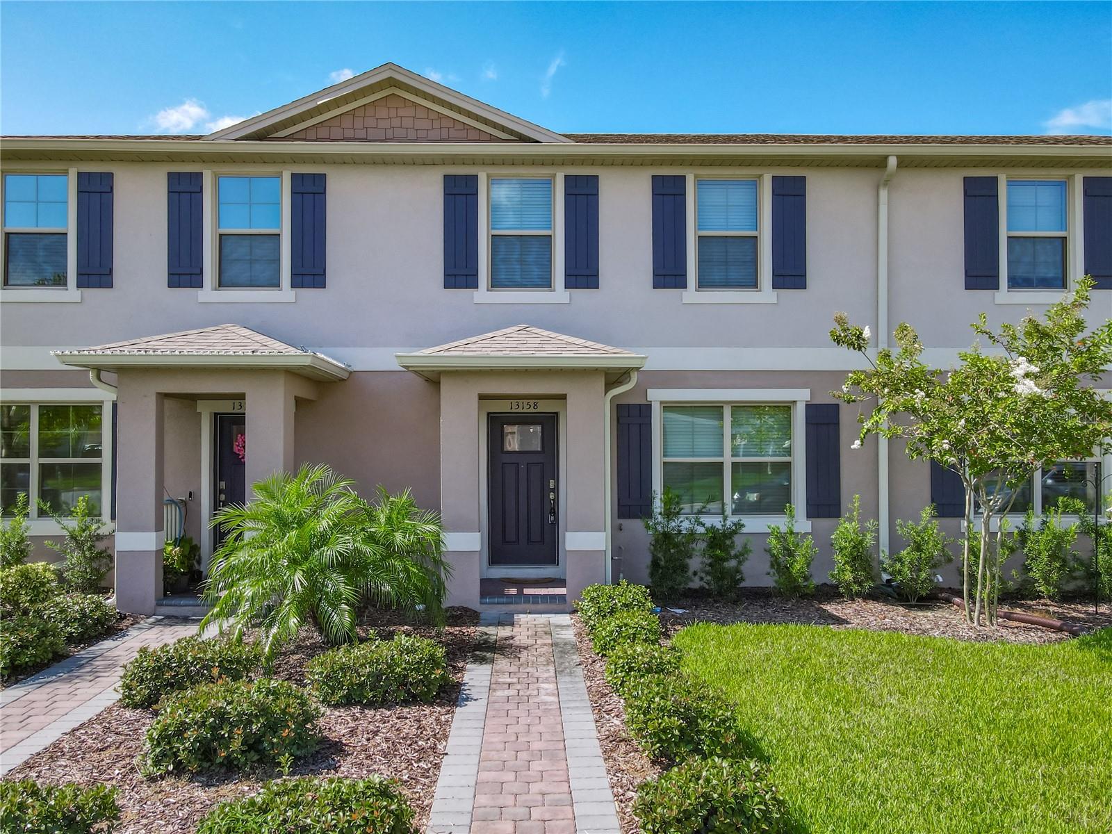 Welcome to the highly sought-after Waterleigh community in Winter Garden, where resort-style living meets everyday convenience! This beautiful Dr. Horton Ibis Model offers 3 bedrooms, 2.5 bathrooms, and a thoughtfully designed two-story layout in a desirable middle-unit townhome.

Step inside to an open-concept floor plan featuring a spacious kitchen with granite countertops, ample cabinetry, and all appliances included—making this home truly move-in ready. The washer and dryer are conveniently located on the second floor alongside all three bedrooms, adding ease to your daily routine.

Enjoy peace of mind with an air conditioning system and hot water heater that are only 1.5 years old. Outside, a paver driveway leads to the attached one-car garage, providing both curb appeal and functionality.

Living in Waterleigh means enjoying exceptional community amenities, including three resort-style pools, a state-of-the-art fitness center, tennis courts, sand volleyball, scenic walking trails, playgrounds, and beautifully maintained green spaces. The HOA takes care of lawn maintenance and mulch, allowing you to spend more time enjoying everything this incredible community.

Ideally located near top-rated schools, shopping, dining, major highways, and all that Winter Garden has to enjoy, this home is the perfect combination of comfort, convenience, and Florida living. Don't miss your opportunity to own in one of Central Florida's most desirable master-planned communities!
