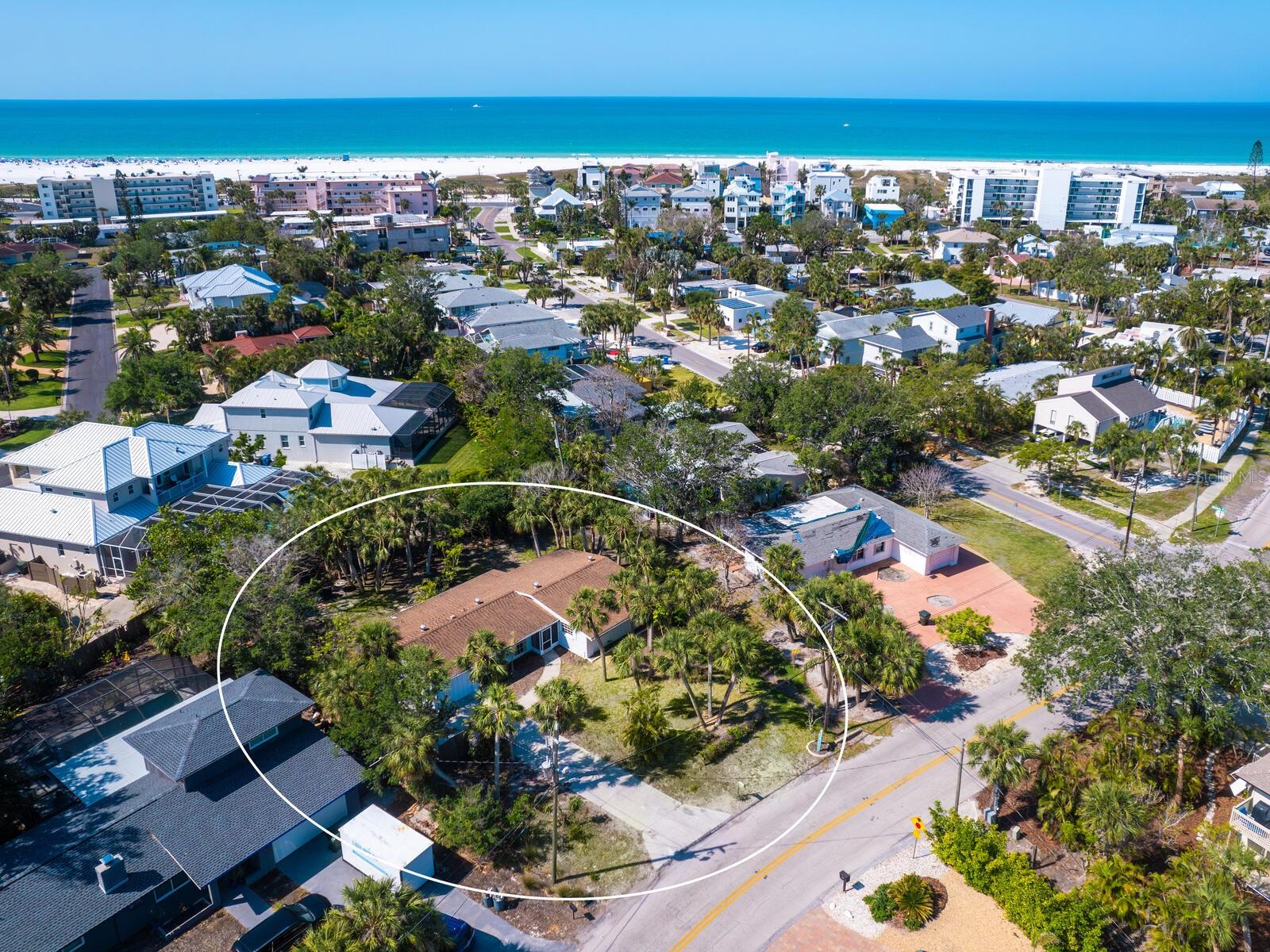 Endless possibilities just two blocks from Siesta Beach! Whether you're looking to remodel the structure or build a new island retreat, opportunity awaits. A prime 12,229-square-foot property in sought-after community of Siesta Isles, just two blocks from the powdery white sands of Siesta Beach, ranked the #1 beach in the USA. This property offers a rare chance to create your dream home in one of Sarasota’s desirable beach neighborhoods. Offering a clean slate for visionary design to renovate or build new. The generous size of the property and ideal location make it ideally suited for a luxury custom home with room for a pool, tropical landscaping and seamless indoor-outdoor living. Enjoy beach access just .2 miles away, or go less than a mile to Siesta Village, where eclectic shops, lively dining and local entertainment await. From morning experiences along the shoreline to breathtaking sunsets over the Gulf, every day on Siesta Key feels like a vacation. And when you're ready to explore beyond the island, downtown Sarasota is just a short drive away, offering world-class dining, arts and culture, including the Ringling Museum, Van Wezel Performing Arts Hall, St. Armands Circle and ever-popular Sarasota Farmers Market. Unlock the potential to create a one-of-a-kind island residence just moments from world-renowned Siesta Beach.