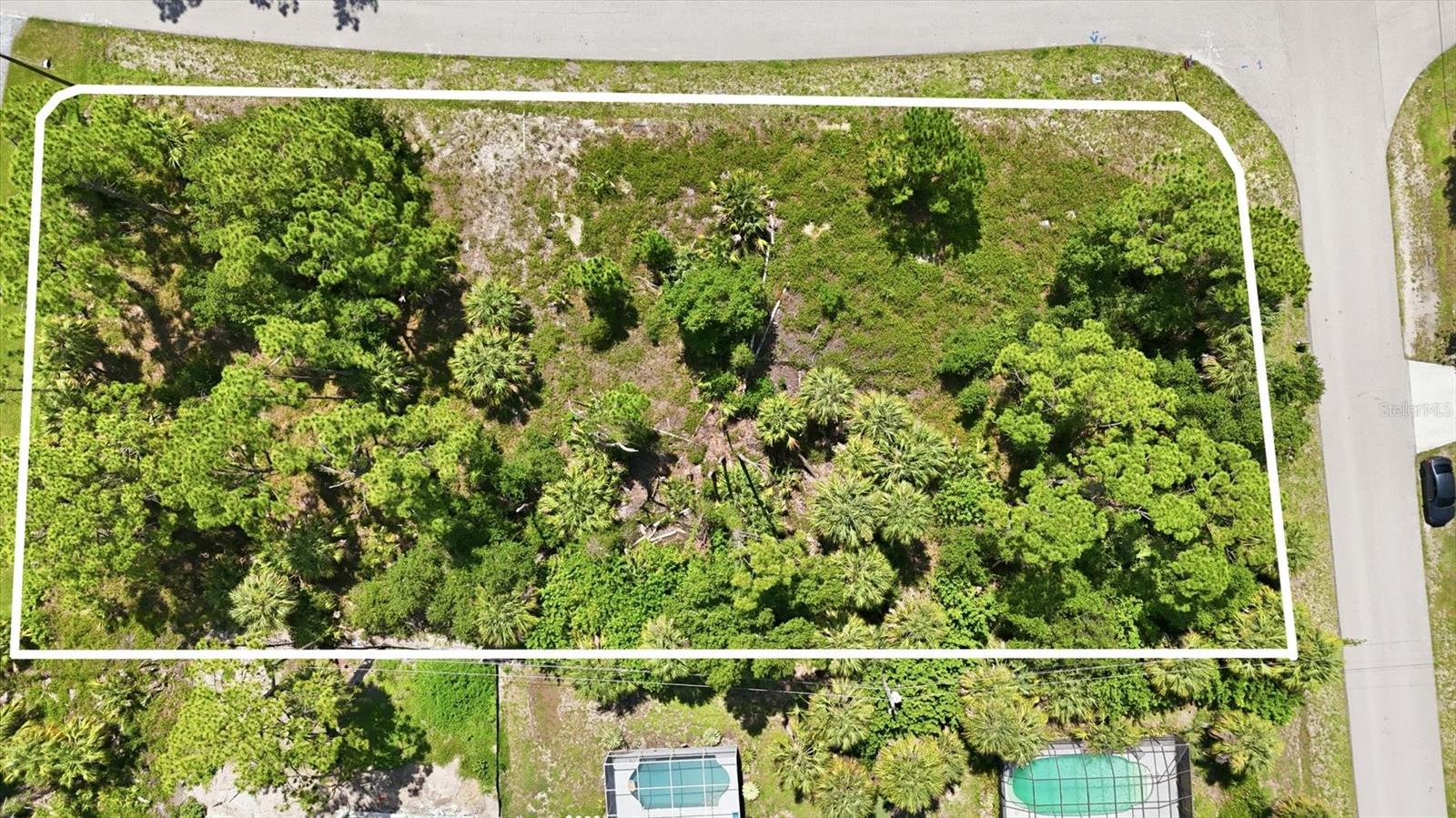 xceptional opportunity to own a rare oversized double corner lot totaling more than half an acre in one of North Port's fastest-growing areas. Whether you're ready to build your dream home now or invest for the future, this spacious property offers the flexibility and location you've been looking for. Ideally situated with convenient access to US-41 and I-75, you'll be just minutes from schools, Suncoast Technical College, the Shannon Staub Library, grocery stores, restaurants, and everyday conveniences. Enjoy endless recreation at the North Port Aquatic Center, featuring a 25-meter competition pool, exciting water slides, and a relaxing lazy river. Experience the vibrant lifestyle of Downtown Wellen Park, where you'll find popular restaurants, boutique shopping, live entertainment, and a weekend farmers market. Outdoor enthusiasts will appreciate the abundance of nearby golf courses, world-class fishing, boating opportunities, and the beautiful Gulf Coast beaches. Sports fans will also enjoy being close to the spring training home of the Atlanta Braves. With its generous size, desirable corner location, and close proximity to everything North Port has to offer, this property is an outstanding place to create your Florida dream home.