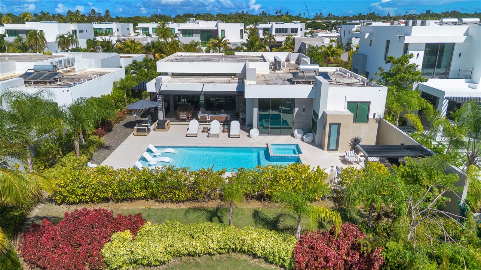 This exceptional residence is offered fully furnished and delivered turn-key, presenting a seamless opportunity to step into the Dorado Beach Resort lifestyle from day one. Thoughtfully designed and currently configured as a 3-bedroom home, the property blends refined interiors with effortless indoor-outdoor living.

The outdoor spaces are equally inviting, featuring a custom pool, fire pit, and a fully equipped BBQ area with electronic screens—ideal for both relaxed family living and elevated entertaining. Inside, the home showcases a beautifully upgraded kitchen, curated high-end furnishings, and professionally designed interiors that create a warm atmosphere throughout.

Every detail has been carefully considered and executed, allowing the next owner to enjoy a fully realized home without the time, complexity, or decision-making of a new build. Residence 23 offers a rare opportunity to immediately experience a polished, move-in ready property in one of Dorado Beach’s most sought-after settings.