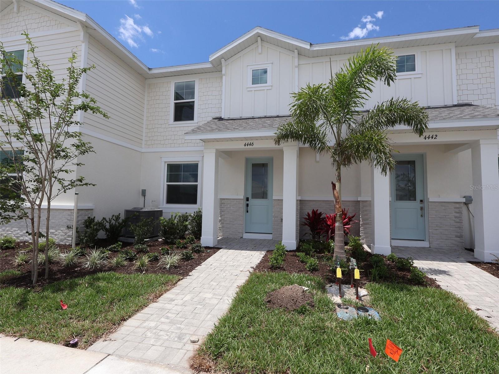 ****SPECIAL FINANCING AVAILABLE FOR A LIMITED TIME ONLY FROM PREFERRED LENDER. RESTRICTIONS APPLY, FOR QUALIFIED BUYERS, SUBJECT TO APPLICABLE TERMS AND CONDITIONS. SUBJECT TO CHANGE WITHOUT NOTICE****
Welcome home to the Bay Harbor. At 1,706 square feet, this townhome features three bedrooms, two and a half bathrooms, and a rear-load, two-car garage.
Walking through the front door, you’re greeted by the spacious great room. Farther in the home sits the gorgeous kitchen with plenty of cabinet and counter space, a center island, and the café. You’ll love cooking your favorite recipes and enjoying entertaining your friends in this space.
The kitchen is the focal point of the main living space for continual conversations and non-stop entertainment. Spend your weekends whipping up some appetizers with your guests while watching football or kicking back in your favorite recliner after a long day. Adjacent to the kitchen, is the powder bath and laundry room.
Head out the back door and walk into your own personal oasis. The lush courtyard features a partially covered lanai that connects to the two-car garage.
Head upstairs and find the luxurious owner’s suite and an additional two bedrooms. The light-filled owner’s suite features two light-filled windows, a walk-in closet, and a private owner’s bathroom. The other two bedrooms are side-by-side and share a second full bath with tub.