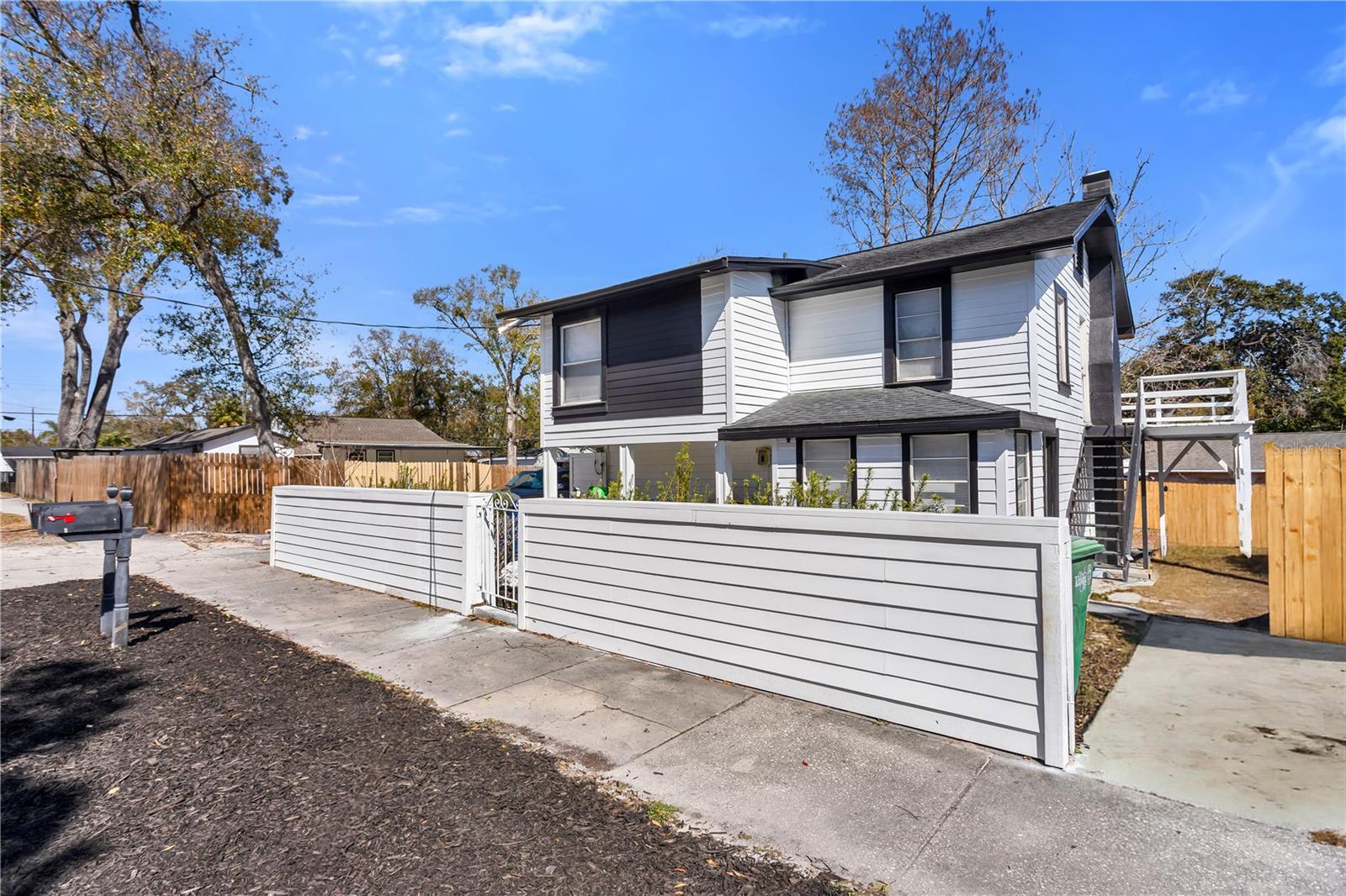 West Riverside Heights income property.  $3110/MONTH PAYMENT STANDARD for 3-bedroom Section 8 rental rate in 33607, giving the buyer an opportunity for even greater cash flow than currently producing. Cash-flowing investment opportunity situated within the rapidly appreciating West Riverside Heights district. This duplex is comprised of two 3-bedroom, 1-bathroom units with a combined 1,864-square-foot footprint. The property has recently been upgraded with BRAND NEW Hardie Board siding, trim, exterior paint, and a brand new exterior fence. The AC was recently upgraded in 2022. The bottom unit is currently vacant, while the upstairs tenants are signed to long-term leases. Allowing the buyer to live in one unit and rent out the other, or lease both units if desired. The centrally located property is located minutes from Raymond James Stadium, Hillsborough Community College (the proposed future site of the Tampa Bay Rays), St. Joseph’s Hospital, Armature Works, and the University of Tampa. Charming and well-performing, this West Riverside Heights gem is ideal for those seeking an immediate cash-flowing asset with the potential for long term appreciation.