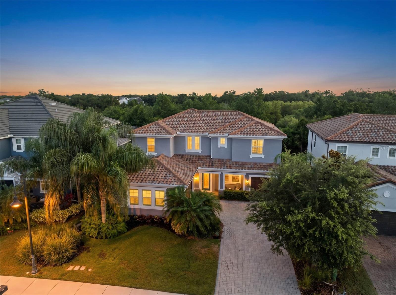 HUGE PRICE IMPROVEMENT! Owner offering a 2026 Club Car golf cart! An exceptional opportunity in Arbor Grande, now offered with added flexibility and value, and positioned as one of the lowest-priced homes per square foot in Lakewood Ranch. As an added bonus, the seller is offering a 2026 Club Car golf cart with an MSRP of $13,500, creating the perfect opportunity to enjoy the Lakewood Ranch lifestyle from day one. 


Perfectly positioned on a quiet cul-de-sac within the gated community of Arbor Grande in Lakewood Ranch, this custom-built CalAtlantic residence features hurricane impact windows, a whole-house generator, Flood Zone X location, new Bosch appliances, and meticulously maintained interiors. These upgrades immediately set this residence apart from the rest while offering the security, quality, and comfort buyers value most. Situated on an oversized preserve homesite near Bob Gardner Park and top-rated schools, this beautifully refreshed home offers exceptional privacy, thoughtful upgrades, and a move-in ready lifestyle in one of the area’s most sought-after communities. Custom built in 2017 and thoughtfully and extensively updated in 2025, this expansive home spans over 3,500 square feet with 4 bedrooms, 4 full bathrooms, a private office, and a spacious 3-car side-entry garage. A dramatic two-story foyer with soaring 20-foot ceilings creates an impressive arrival, while expansive open living spaces filled with natural light are designed for both elevated entertaining and comfortable everyday living.

 At the heart of the home, the chef’s kitchen is beautifully appointed with new Bosch appliances including a gas cooktop and French door refrigerator, an oversized quartz island, Timberlake cabinetry, and a generous walk-in pantry designed for both function and gathering. Recent upgrades throughout the home include Sherwin Williams Emerald interior paint, luxury carpeting, Kohler light fixtures, updated plumbing fixtures, new bathroom quartz countertops, Toto toilets, Minka Aire ceiling fans, an ADT security system, and a Culligan water filtration system, all contributing to the home’s elevated yet comfortable feel. 

Designed to embrace indoor-outdoor Florida living, the home features two covered and screened lanais, one on each level, overlooking a tranquil preserve backdrop that offers exceptional privacy. The expansive backyard provides ample space to create a custom outdoor oasis while still enjoying the peaceful natural setting. 

Residents of Arbor Grande enjoy resort-style amenities including a junior Olympic saltwater beach-entry pool, a 10,000-square-foot clubhouse, fitness center, bocce courts, and private gated access to the scenic trails and green space of Bob Gardner Park. Lawn care and irrigation are included through the HOA, creating a low-maintenance lifestyle just minutes from top-rated schools, championship golf, University Town Center, downtown Sarasota, and the Gulf Coast beaches of Siesta Key, Lido Key, and Anna Maria Island.