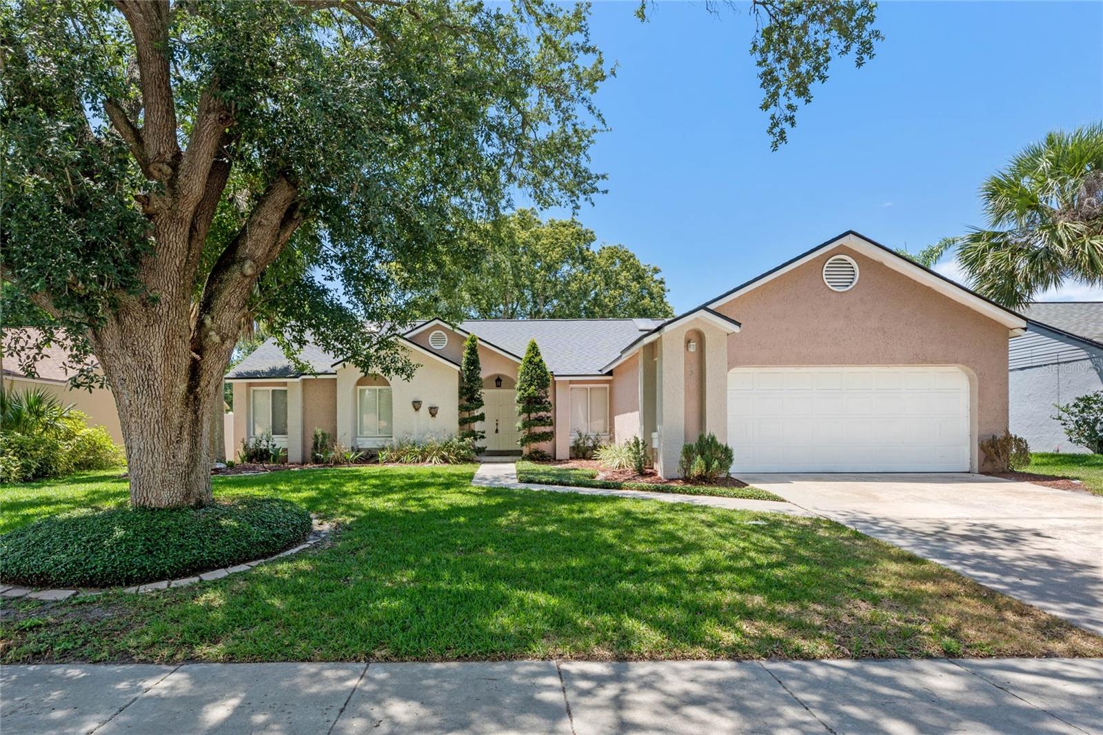 Welcome home to 521 Lakeshore Cir, a beautifully upgraded one-story retreat in the heart of desirable Lake Mary, zoned for top-rated Seminole County schools. This spacious 4 bedroom, 2 bathroom home offers 2,032 square feet of thoughtfully updated living space on a generous 0.21-acre lot, blending comfort, character, and everyday functionality. Step inside to find gorgeous porcelain wood-look tile flooring flowing throughout the home, setting a warm and cohesive tone from room to room. The kitchen has been beautifully upgraded with granite countertops, gorgeous cabinetry, and stainless steel appliances, creating a bright and inviting space to cook and gather. The versatile floor plan includes a converted 4th bedroom in the former garage space, complete with an oversized walk-in closet, perfect for a guest suite, home office, or growing family. Major updates provide peace of mind, including a new roof (2020) and a new AC unit (2019). Step outside to your private backyard oasis, where a charming gazebo and pergola set the scene over a paver patio connecting the outdoor living areas, ideal for relaxing or entertaining. Enjoy a fenced yard, offering privacy and room to enjoy the Florida sunshine. Ideally located in the heart of Lake Mary, this home offers easy access to I-4, Lake Emma Road, and Greenwood Blvd, putting shopping, dining, and top-rated schools just minutes away. Don't miss this rare opportunity to own a beautifully upgraded home in one of Seminole County's most sought-after communities.