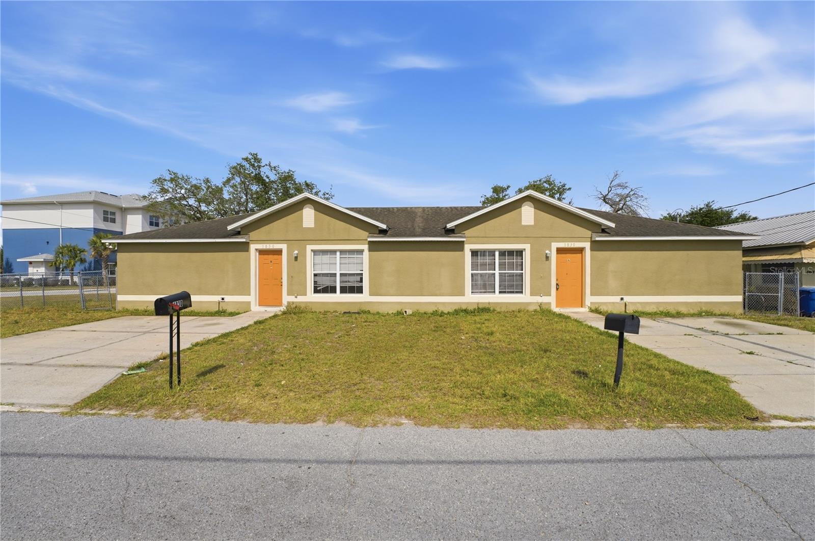 Calling all investors and house-hackers! Welcome to 1830 2nd St NW, a fantastic multi-family investment opportunity located right in the heart of Winter Haven. This well-maintained duplex features two spacious, mirror-image units, each offering a highly desirable 3-bedroom, 1-bathroom layout perfect for maximizing rental income and attracting long-term tenants! Both units boast bright, open-concept floor plans designed for easy living and low maintenance. Step inside to find durable ceramic tile flooring flowing seamlessly throughout the main living areas and kitchens, paired with crisp, neutral paint that makes the space feel fresh and inviting. The kitchens are fully equipped with rich wood cabinetry, ample counter prep space, white appliances (including dishwashers!), and a convenient breakfast bar/passthrough that overlooks the spacious family room. To top it off, each unit includes its own dedicated in-unit laundry closet with a stackable washer and dryer—a major premium for prospective renters.