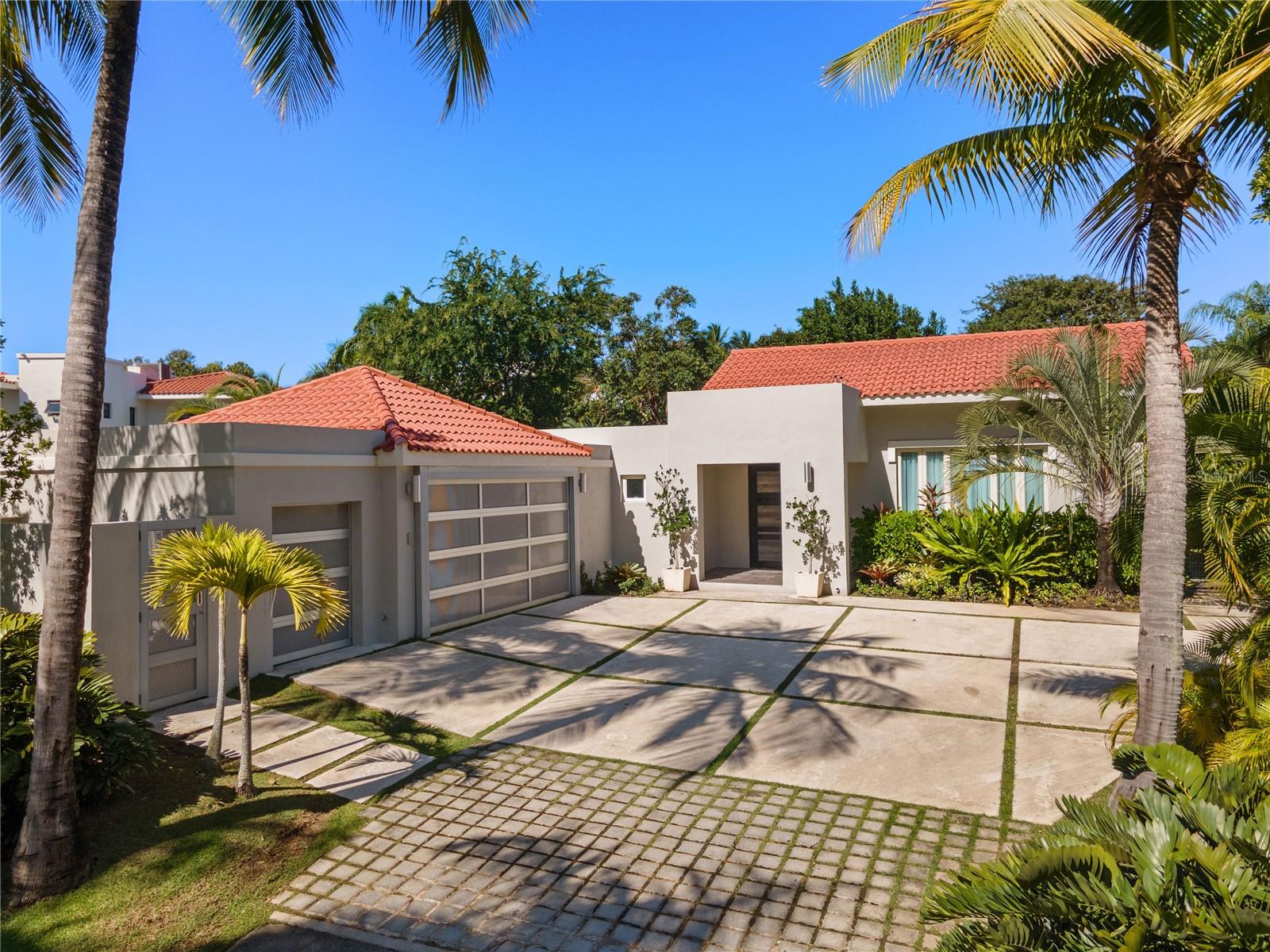 Discover your new oasis in Dorado Beach East, Puerto Rico! This luxurious property boasts a spacious lot size of 1161.35m2, providing ample space for your private paradise. With a build size of approximately 4,300 total SqFt, this home embraces the concept of open living, creating a seamless flow between its well-appointed spaces.

Indulge your culinary senses in the kitchen adorned with custom Italian marble cabinets, where SubZero and Wolf appliances await your culinary creations. 

The residence features 4 bedrooms and 3.5 bathrooms, providing comfort and privacy for all occupants. The masterfully designed pool area invites you to relax and unwind, complemented by an expansive terrace that sets the stage for outdoor entertainment and enjoyment.

As an added bonus, discover a charming casita with its own bathroom and kitchenette, offering versatility and potential for guest accommodation or office space. This property is not just a house; it's a lifestyle, offering a perfect blend of sophistication, functionality, and relaxation in the heart of Dorado Beach East. Welcome home!