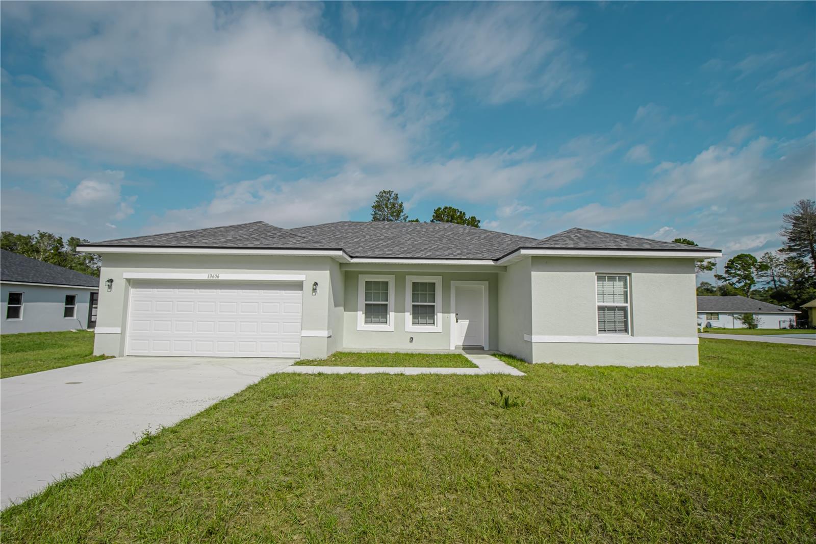 One or more photo(s) has been virtually staged. This brand-new house is a wonderful opportunity to live or invest in Ocala! Built in a very well-located lot, this home offers a modern style with 4 comfortable bedrooms and 2 bathrooms, a spacious open floorplan where you can host big family gatherings and a complete kitchen with all stainless-steel appliances including range, refrigerator, disposal, dishwasher and microwave, an island and great cabinet space. There are beautiful granite countertops in the kitchen as well as in the bathrooms, and tile flooring installed in all the rooms and living space, great for easy maintenance. Schedule your visit today!
If choosing to use our preferred lender, there will be a $2,000 credit towards closing costs.