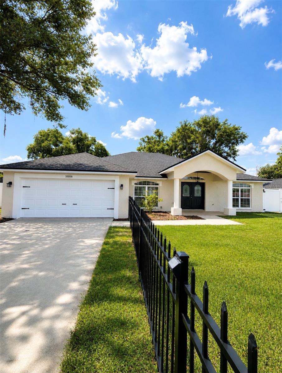 (Brand new roof and new well pump!!!) - NO HOA-
Where comfort, privacy, and modern upgrades come together in a truly move-in-ready home.
This beautifully renovated 4-bedroom, 2-bath residence has never been lived in since its transformation, offering a fresh, like-new experience from the moment you step inside. The heart of the home features stunning new Quartz countertops, perfectly complementing the updated finishes and inviting layout designed for both everyday living and entertaining.
Enjoy peaceful mornings and relaxing evenings with picturesque views of Smith Lake, right from your own property. The spacious backyard is fully enclosed with a privacy fence, creating a perfect retreat for gatherings, pets, or simply unwinding. Out front, a charming iron-fenced area adds curb appeal and a touch of elegance.
Inside, the home continues to impress with a luxurious soaking tub in the primary bath, generous bedroom space, and a 2-car garage for convenience. Step outside to a large back porch sitting area—ideal for enjoying Florida’s beautiful weather year-round. Mature fruit trees add both beauty and function to the landscape.
Located in a highly desirable neighborhood, this home offers the perfect blend of tranquility and accessibility. If you're looking for a turnkey property with modern upgrades, scenic views, and plenty of outdoor space, this one checks every box.