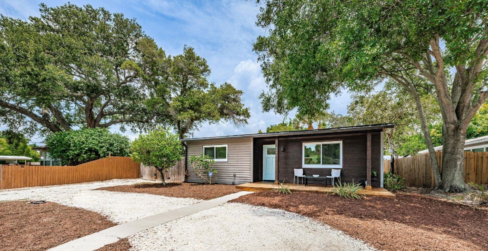 Welcome to your bright and sunny three-bedroom, two-bathroom oasis in the heart of the artsy district of Gulfport. This house is in a non-flood zone and does not require flood insurance. Minutes from white sand beaches, trails, parks, salons, and so much more. This home features a spacious layout with a family room, separate dining room, and flex space that could be used as a home office, game room, or entertainment area. Upgrades include a tankless water heater, water softener and filtration system, updated electrical panel, new impact resistant windows, and remodeled interior. With a circular driveway in the front and additional parking in the back, this home can accommodate up to six vehicles with room to park an RV or boat.