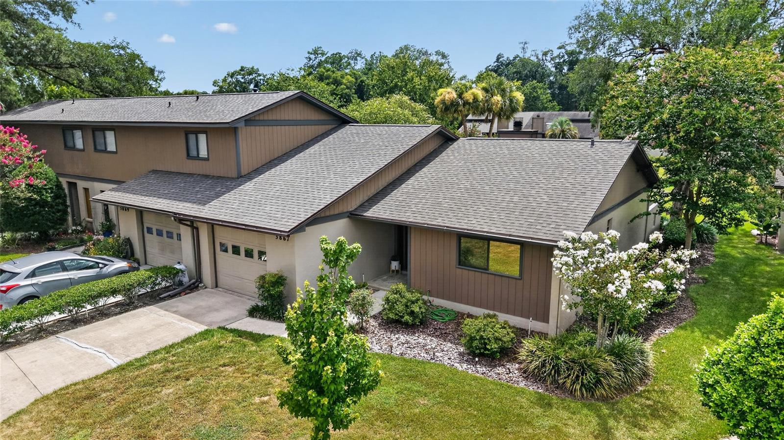 Welcome to this beautifully updated end-unit patio home in the peaceful community of The Village. The bright and spacious living room features a wood-burning fireplace and sliding glass door that opens to a private courtyard overlooking the community green space and swimming pool. The updated kitchen offers newer cabinetry and butcher-block countertops. Additional improvements include luxury vinyl flooring, PVC baseboards, an updated primary bathroom, and major 2024 upgrades, including the roof, HVAC system, and water heater.
Situated along a quiet loop, the home is just a short walk from the community pool and pavilion. The association fee includes water, trash removal, exterior lawn care, community grounds maintenance, and access to the community pool. Schedule your private showing today and discover all this lovely home has to offer! The Village is an owner-occupied community, and rentals are not permitted.