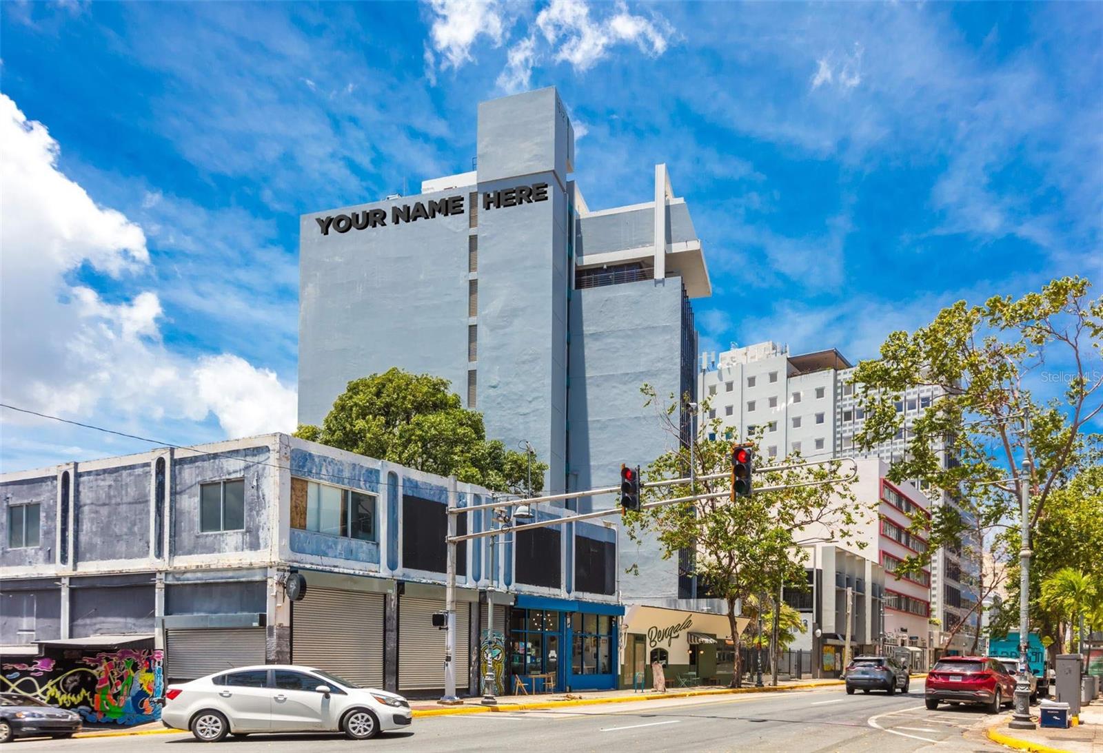 Positioned along one of San Juan’s most dynamic commercial corridors, this exceptional office opportunity at Santurce offers unmatched visibility, flexibility, and branding potential. Located at 1612 Av. Juan Ponce de León—directly across from Cobian Plaza—this prominent space, formerly known as the Avianca Building, presents a rare chance to own a high-profile commercial asset in the heart of the city.

Spanning approximately 3,797 square feet across two levels, this ground-floor office is thoughtfully designed to support a wide range of business operations. The layout features eight private offices, a spacious reception area with impressive double-height ceilings, and a large conference room ideal for meetings, presentations, or collaborative work. A full kitchen, dedicated storage area, and three bathrooms—including one with a shower—provide convenience and functionality for both staff and clients.

What truly sets this property apart is its unparalleled signage and branding rights. Ownership includes exclusive naming rights to the building, along with the ability to install prominent billboard advertising and street-level signage at the office entrance—offering maximum exposure along bustling Avenida Juan Ponce de León.

Additional highlights include two dedicated parking spaces and immediate accessibility within one of San Juan’s most vibrant business and cultural districts.

Offered at $1,300,000, this is a rare opportunity to establish your business presence in a landmark location with built-in prestige, visibility, and long-term value.