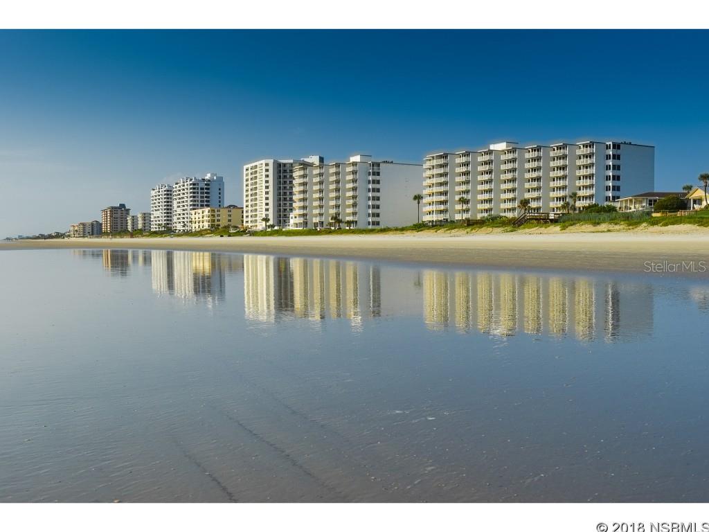 Charming direct oceanfront condo on New Smyrna's no-drive beach. Enjoy oceanfront living in a safe gated community with a unencumbered view of the ocean. Watch the sunrise every morning over the ocean and the sunset every evening. Common amenities include an oceanfront geothermal heated pool, clubhouse, tennis courts, shuffleboard, horseshoes and grill area on manicured grounds.  LOW HOA fees, pet friendly AND a great rental history, don't miss out on this piece of heaven! ;Water: City
