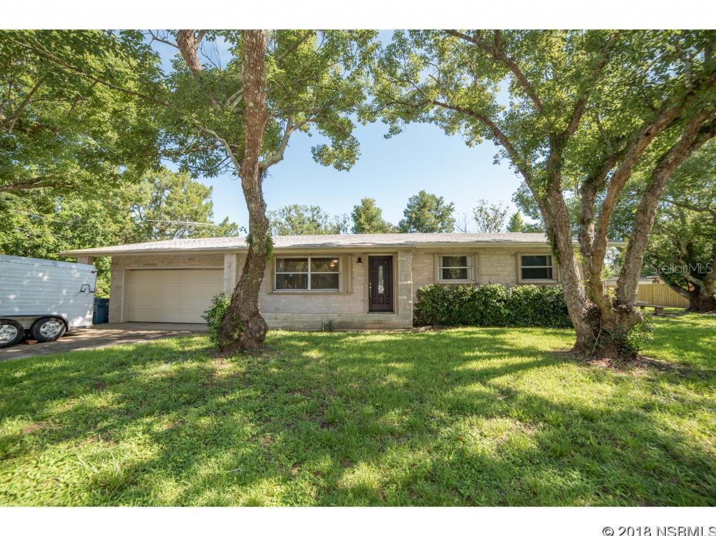 This home is a must see!  Great 3 bedroom / 2 bath home sits on almost 1/2 acre corner lot with plenty of room to park your boat or RV.  Home comes with many updates - New bathrooms and refreshed kitchen with open floor plan.  Beautifully refinished hardwood floors.  Other updates include:  New Roof 2015, New AC installed 2014 and New electric panel.  Plenty of room in the 28' x 30' garage. ;Water: City