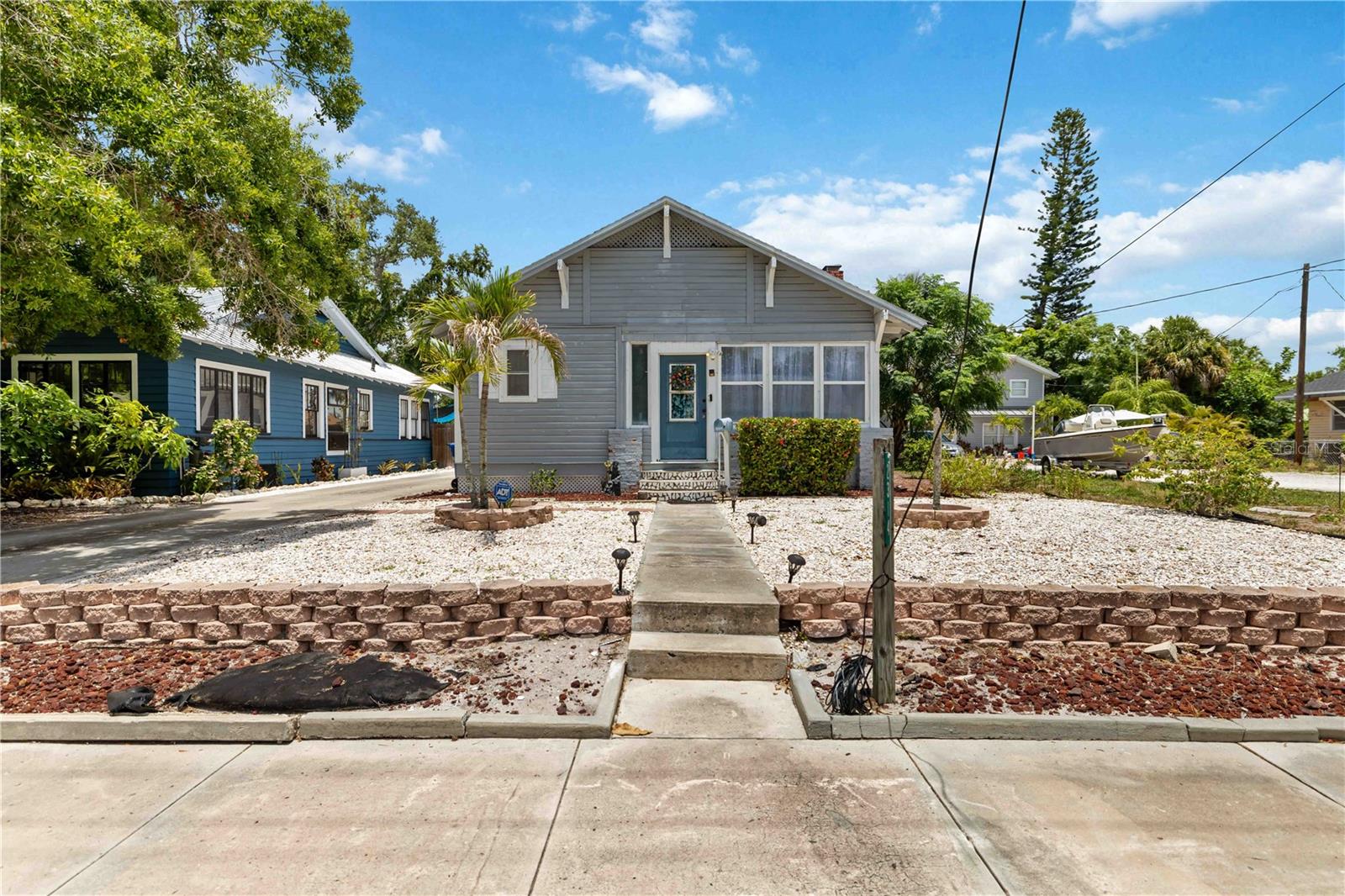 Character. Location. Opportunity.
Just 3 miles from the heart of Downtown Bradenton and less than 10 miles from some of Florida's beautiful Gulf beaches, this charming home offers the perfect blend of historic charm and everyday convenience. Whether you're looking for a primary residence, a second home, or your next investment property, the location alone makes this one worth a closer look.
Downtown Bradenton continues to see exciting revitalization, making this an appealing option for buyers looking for long-term potential in a growing area. Inside, you'll find timeless character that simply can't be replicated, including a cozy natural gas fireplace and the unique details that make historic homes so special.
Outside, the low-maintenance turf backyard creates a private space to relax or entertain, while the detached garage provides added flexibility for storage, a workshop, or parking. Fruit trees add to the charm, and natural gas service powers the water heater, range, dryer, and fireplace for added efficiency and convenience.
If you've been searching for a home with personality, a prime Bradenton location, and investment potential, this one checks all the boxes.