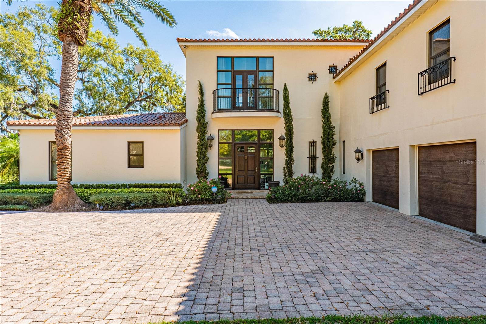 WINTER PARK CHAIN OF LAKES! This AMAZING LAKE HOUSE is situated just minutes away from the Charming and Historic Winter Park Avenue and walking distance to Rollins College and is set on 1.70 ACRES of land with nearly 200 feet of lake frontage.  Enjoy the beautiful and highly sought after Lake Mizell, which accesses all the other lakes on the Winter Park Chain. This uniquely rare property features a lovely long and windy driveway lined with pavers. As you begin approaching The Estate you will feel swept away by its Mediterranean Charm. A gorgeous solid Oak door sits right below the Juliet Balcony that comes off of the Primary Bedroom Suite. The amazing backyard oasis is in an ultra private setting boasting breathtaking mature Oak Trees, lush landscaping, a fabulous pool area. This backyard is truly immense and perfect serene setting for entertaining friends and family, hosting parties, ceremonies, events, holidays and more. 5 Large Bedrooms, 5 Full bathrooms, and bonus upstairs living room area. This property has it all, and is in one of the MOST DESIRABLE AREAS IN ALL OF CENTRAL FLORIDA! Centrally located, shopping, restaurants, local farmers market, entertainment, boutiques, museums, outdoor parks, nearby highway for commuting. *SCHEDULE SHOWING TODAY* MAKE AN OFFER*