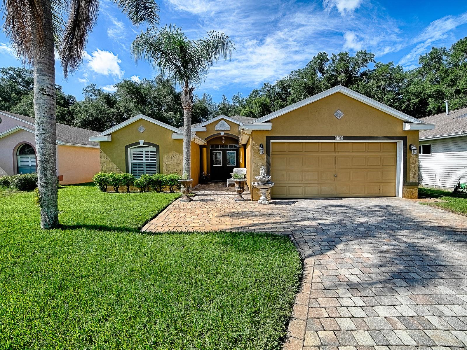 NEW TO MARKET - PRIVACY
EXPECT THE UNEXPECTED with this block/stucco 3 bedroom/2 bath home with PRIVACY. Your private oasis in the back is under a screened birdcage with an in ground spa. There is plenty of space for parties or just relaxing and watching the birds. You have a large entryway that draws your view right to the backyard area. Your kitchen is open to the main living area. NO CARPET HERE! The primary bedroom has sliders to the lanai. You have an inside laundry room with a large pantry. If you are looking for privacy, open space, plenty of backyard area, block/stucco and no carpet, this home is for you. Pennbrooke Fairways, a 55+ Community! This hidden gem of a community is located just 5 minutes south of The Villages, less than an hour to Orlando, Tampa and Daytona Beach within 90 minutes... just a perfect location for day trips! Pennbrooke Fairways golf course offers golfers two executive nines and one regulation nine. Golfing packages are available for community residents and open to the public. Pennbrooke offers RV and Boat Storage with Dump & Wash Stations and 24-hour Gated, Guarded Security. The community center offers a Hair Salon, Library and Real Estate Community Office onsite. Your HOA includes cable, internet and lawn cutting services. 55+ only community with pools, club recreational centers, 3 golf courses, restaurant, pub, walking trails, pickleball, shuffleboard and much more! Loads of fun activities are planned throughout the year! Conveniently located within minutes of The Villages and Brownwood Town Square... enjoy all the shopping and dining the Villages has to offer and just minutes to Downtown Leesburg. Central Florida living at its best! Expect the unexpected!