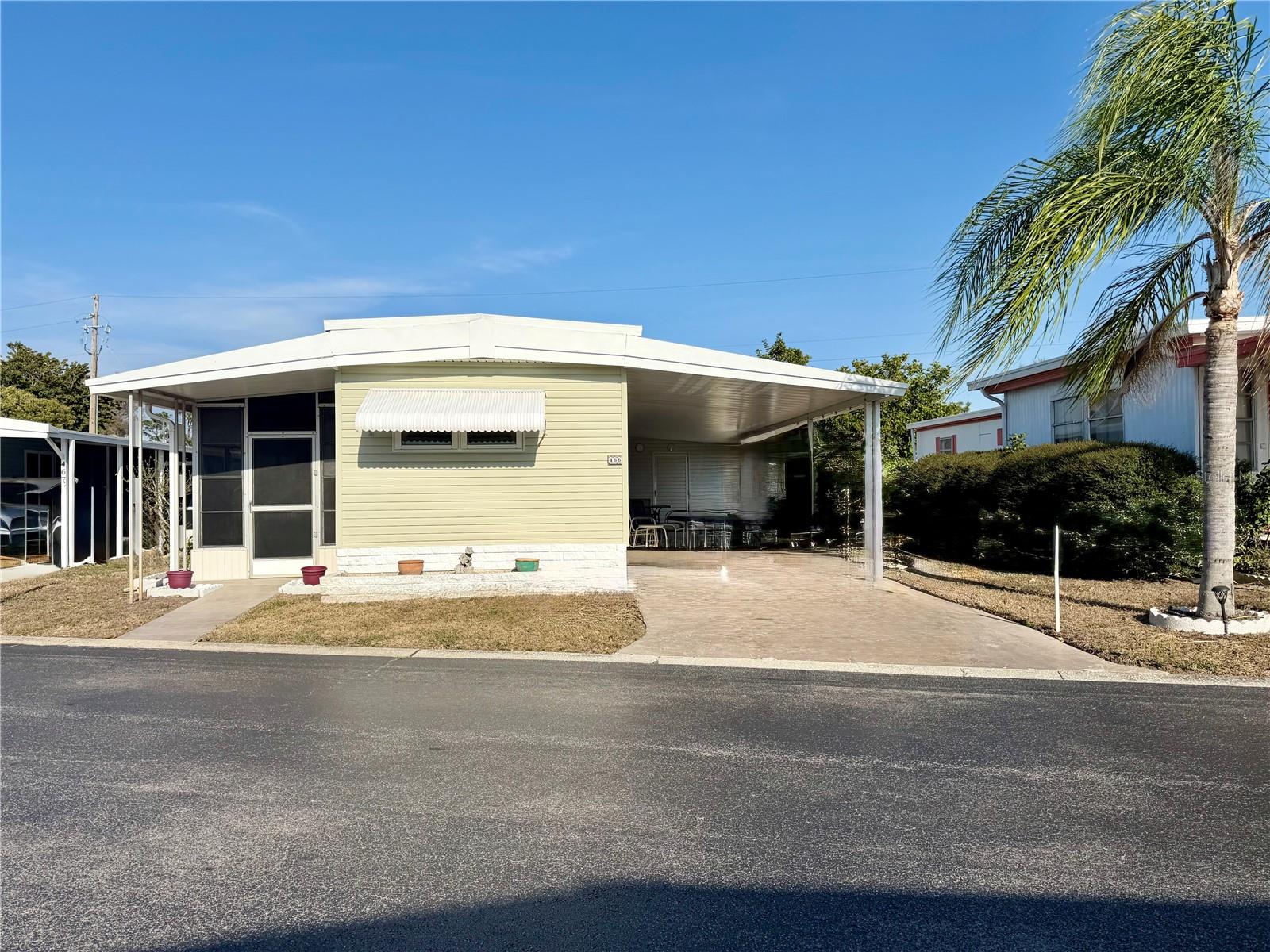 Welcome home!  This beautifully updated and TURNKEY for the next owner, 2- bedroom, 1- bath mobile home has been thoughtfully renovated over the past several years and is meticulously maintained.  Enjoy added living space in the bright 20x7 Florida room, plus the convenience of a covered carport where you can enjoy your grill and relax.  The spacious shed includes a laundry room and a separate dedicated tool/ workroom.  Behind that you will find a quiet and private patio where you can enjoy spacious back yard space.

Whether you're looking for seasonal sunshine or fulltime fun FL living, this home check all the boxes!
Located in desirable Clearwater Cascade 55+ community featuring two heated pools, hot tub, saunas, fitness center, clubhouse, library, shuffleboard, bocce ball, and regular social event bring your dancing shoes and join the fun! 

UPGRADES over the years include- New double pane windows, new doors, kitchen- range, refrigerator, microwave, new subflooring with vapor barrier, Roof over, new vinyl siding.