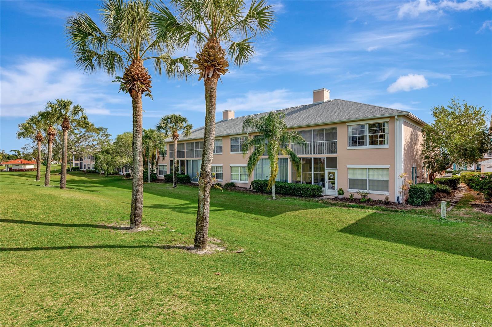 Welcome to effortless Florida living in the desirable community of Fairways at Peridia! This beautifully maintained second-floor condo offers the perfect blend of comfort, style, and scenic views. Step inside to discover soaring vaulted ceilings that enhance the spacious, light-filled layout. The versatile floor plan features 2 bedrooms, 2 bathrooms, and a den—ideal for a home office, guest space, or cozy retreat. Enjoy your morning coffee or unwind in the evening from not one, but two outdoor spaces: A private back patio overlooking the golf course, offering peaceful, lush green views and front balcony with tranquil water views, creating the perfect cross-breeze and serene setting Offered turnkey furnished, this condo is truly move-in ready—just bring your suitcase and start enjoying the Florida lifestyle from day one. Additional highlights include: One-car garage for convenience and extra storage, open-concept living and dining areas perfect for entertaining low-maintenance living in a beautifully maintained golf community. Located within the sought-after Peridia Golf & Country Club, residents enjoy access to golf, dining, social activities, and a vibrant, active lifestyle—all just minutes from shopping, dining, and Gulf Coast beaches. This is your opportunity to own a slice of paradise with stunning views from every angle—schedule your private showing today!