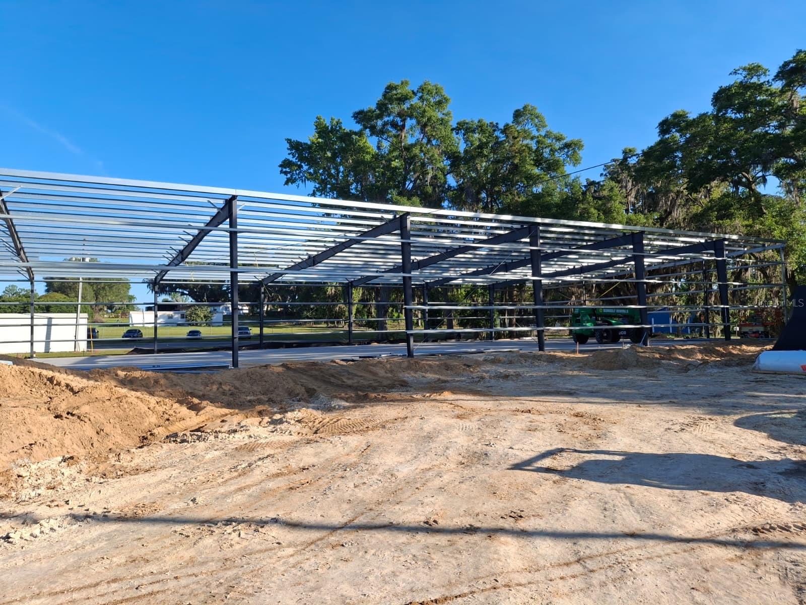 Under Construction. Currently under Construction. Commercial Zoned [B5] allowing many different uses. Brand new 15,600 sq. ft. Warehouse building located on 1.38 Acres right on SE County 484 Highway located in Belleview Florida. Site & building is currently under construction with an Estimated Completion Date by September of 2026. Attached Site Plan & Building Plans are Attached for Review.