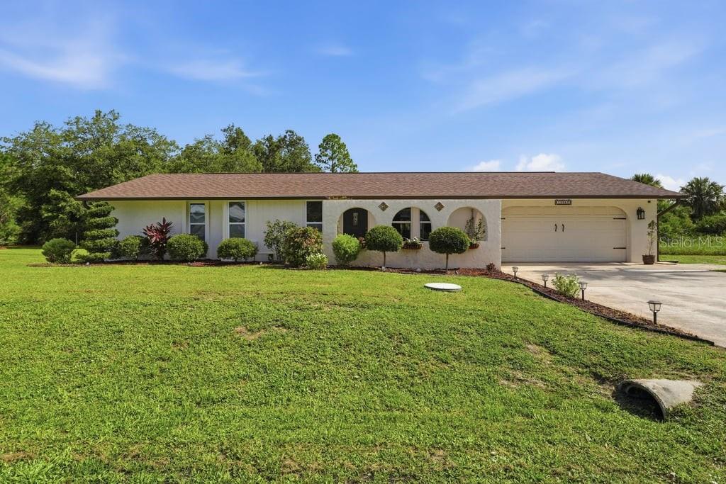 THIS IS THE ONE YOU'VE BEEN WAITING FOR! No HOA, No CDD, Double Lot, Pool Home, and Flood Zone X—the Florida lifestyle you've been searching for!
YES BRING YOUR BOAT! YES BRING YOUR RV! With no HOA restrictions and a spacious double lot, you'll have the freedom and room to enjoy it all.
This well-maintained 3-bedroom, 3-bath home offers 2,668 total square feet and features an inviting open-concept, split-bedroom floor plan that's perfect for both everyday living and entertaining. The well-appointed kitchen includes a breakfast bar and flows seamlessly into the living and dining areas, while tile and luxury vinyl flooring add style and durability throughout. Sliding glass doors open to the expansive screened lanai, creating effortless indoor-outdoor living. Primary suite bedroom features a full den sitting area, ensuite bathroom with walk-in shower, and large walk-in closet with stylish barn doors, and patio doors allowing direct access to the pool. Bedroom #2 also has it's own en-suite full bath and sliding doors that lead out to the pool.  
Step outside to your private backyard oasis featuring a 28' x 40' screened lanai and a generous 14' x 28' pool—ideal for relaxing afternoons, entertaining family and friends, or enjoying breathtaking Florida sunsets with your favorite evening beverage.
The oversized double lot is beautifully landscaped with mature trees, irrigation, landscape lighting, and manicured grounds, offering plenty of space to store your boat and RV or even build the detached garage or RV garage you've always wanted.
Major updates provide peace of mind, including: Complete water re-pipe (2025), New roof (2022), New septic system (2022), Updated electrical panel (2022), New windows (2016). 
Conveniently located just minutes from beautiful Gulf beaches, world-class fishing and boating, golf courses, Major League Baseball spring training, exceptional dining, shopping, and quality medical facilities, this home truly offers the best of Southwest Florida living.
Properties like this are hard to find. Schedule your private showing today before this incredible opportunity is gone!