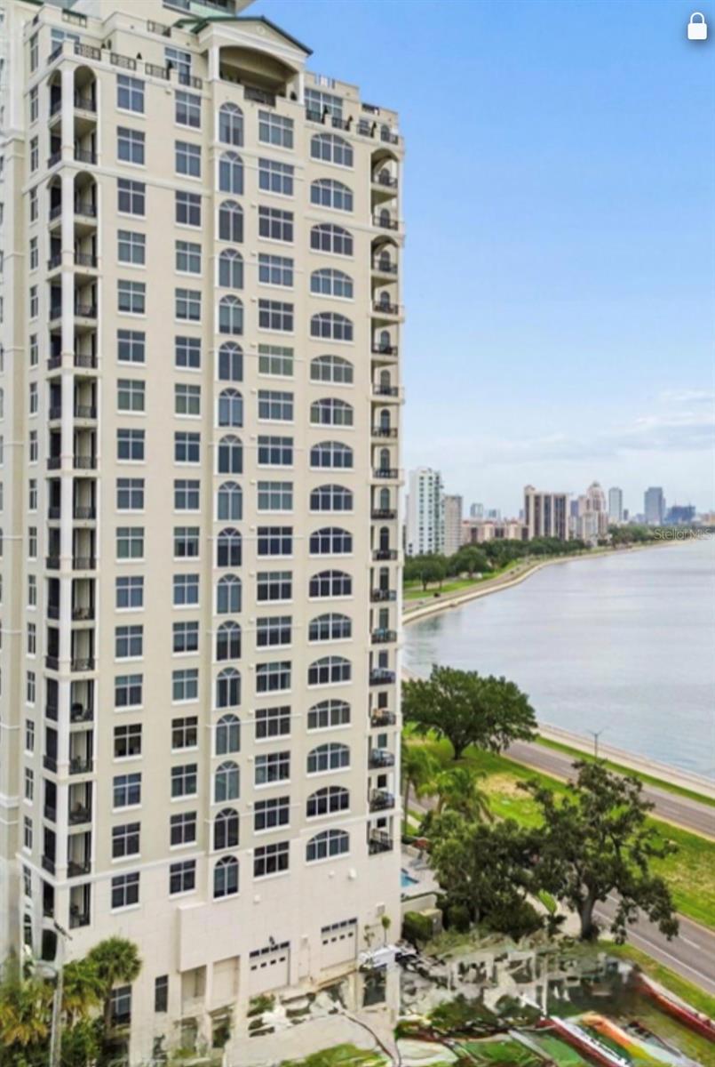 Experience the ultimate in true luxury living in this rarely available 12th floor 02 unit at The Stovall, one of Tampa's most desirable addresses, offering priceless panoramic views of Tampa Bay, the iconic Bayshore Blvd., Downtown Tampa, and westerly sunset views of St. Petersburg.  A private elevator opens to the classically elegant living room with a beautiful gas fireplace and access to the east terrace.  For entertaining friends and family there is a convenient wet bar area complete with ice maker and wine cooler overlooking the formal dining room. The gourmet kitchen offers custom cherry cabinetry, new quartz countertops, and top of the line appliances.  The kitchen is open to the family room which features a wall to wall bookcase and access to one of two terraces.  The primary bedroom has separate his and her baths and walk in closets.  A second bedroom is perfect for guests and the third bedroom serves as an elegant library or office.  The Stovall offers 24 hour security, concierge service, conference room, fitness center, library, game room with full kitchen, stunning pool overlooking the Bayshore, plus incredible guest suites for your out of town friends and family.  This spectacular residence comes with 2 parking spaces in the secured garage and one large a/c storage unit.  
***ALL OFFERS MUST BE SUBMITTED IN N WRITING WITH PROOF OF FUNDS BY 5 P.M. JUNE 18TH.  THE SELLERS WIL RESPOND TO ALL OFFERS BY JUNE 19TH.  NO 02 UNIT HAS BEEN AVAILABLE TO PURCHASE SINCE JUNE 2022.