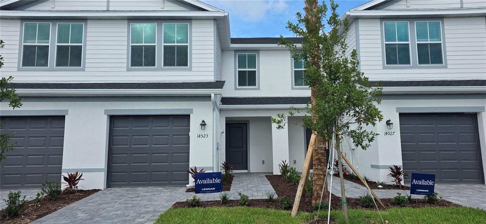 Brand-new and move-in ready! This Lennar Bennett floor plan in Aurora at Lakewood Ranch offers 3 bedrooms, 2.5 bathrooms, and a spacious open-concept design. The main level features a modern kitchen overlooking the dining area and great room, with sliding glass doors leading to a private patio. Upstairs, the owner's suite is joined by two additional bedrooms and a convenient laundry area. Featuring The Builders Everything's Included® package with stylish finishes, smart home features, and energy-efficient construction. Aurora residents enjoy maintenance-free living, a community pool, playground, scenic lakes, and convenient access to shopping, dining, schools, and all that Lakewood Ranch has.