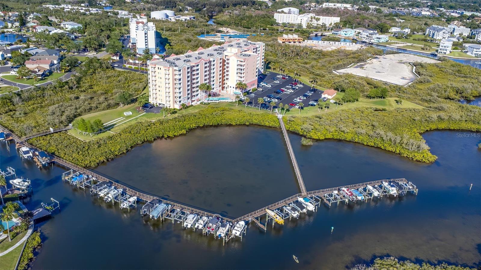 One of Pasco County’s Largest Condos with a dramatic price reduction!  This move-in ready & Maintenance-free, pet-friendly Gulf of Mexico waterfront Condominium is ready for a new owner! 6th Floor spacious 3 Bedroom, 2 FULL Bathroom condo with 1525 heated square feet!! LARGE PRIVATE BALCONY prefect for seeing fireworks and sunsets.   Coastal accented with blue walls makes this a relaxing tranquil retreat.  Nothing overlooked with LVP flooring and hand titled kitchen backsplash and under cabinet lightning.  Including Levoler blinds and new water heater!  Privately assigned parking space included. Split bedroom floor plan. All bedrooms have a HUGE walk-in closet for ample storage! Oversized Master Bathroom with dual under mount sinks, separate shower, garden tub with jets, and recessed lighting. IN-UNIT laundry with included washer and dryer!!  Access to the private balcony from the Master Bedroom and living room.  Stainless Still appliances, solid surface countertop with under-mount sink.  Enjoy Gulf breezes and beautiful night skies and SUNRISES. Seaview Place is a very active community with many amenities and social activities to enjoy! NOT 55+!   Condo Fee INCLUDES: on-site property manager, basic Cable, WATER & SEWER, Trash, Fishing dock, heated pool with separate heated spa, pool showers, gas BBQs and cabana area, Exercise Room with 2x SAUNAs, separate Aerobics Room, Library and Office Area, large Club Room with Kitchen - (Perfect for your events!), pool table, big screen tv, baby grand piano, living room area, and balcony as well as rooftop access with amazing views of the Gulf. ULTRA LOW homeowners insurance rates. Additional Optional Membership is available to Gulf Harbors PRIVATE BEACH CLUB - One of only two PRIVATE beaches in the state of Florida. Close to shopping, restaurants, entertainment, downtown, and highways that lead to Tampa, Clearwater, St Pete, and all that Florida has to offer! Schedule your appointment today!
