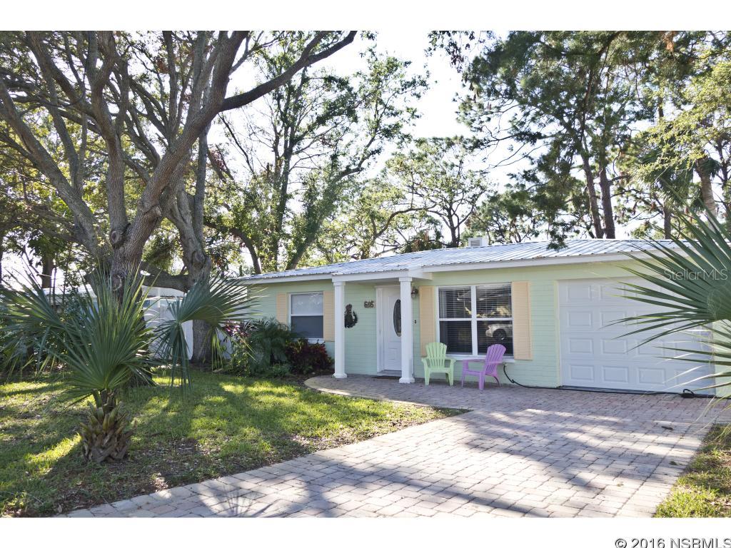 2/1 WATERFRONT Block Home ON BEACHSIDE! Enjoy fishing from your dock  at this remodeled beach house. Located on a saltwater tidal lagoon. North beach; walk to Flagler Ave! The remodeled interior has a new kitchen with granite counter tops, a bar,  stainless steel appliances, and newer windows. Updated travertine bathroom has a step in shower. Indoor laundry room.   Features include; metal roof, driveway pavers, sprinkler system with well pump, side and backyard PVC white fencing, metal hurricane shutters and a built-in fire pit for outdoor relaxing. ;Water: City