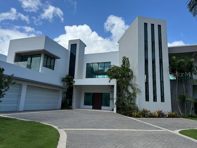 Your own piece of paradise awaits you...

Brand new two-story modern home with spectacular views of golf, lakes and Bahia's natural sanctuary fully equipped ready for delivery.

First Floor
     Oversized Great Room with double-heighted ceiling
     Full Kitchen with Pantry
     Powder Room
     Media/Family Room
     En-Suite Guest Room
     Infinity Pool with spectacular golf & lake views
     Large Terrace with outdoor kitchen for entertaining
     Laundry Room
     Mud Room
     Three car enclosed garage

Second Floor
     Master Suite with his & hers walking closets and Master Bath with terrace
     Studio
     Two En-Suite Bedroom with Terraces

Includes: Diesel Generator, Back-up water cistern, water heater, Lube Cabinets & GE Monogram Appliances; provisions for elevator.