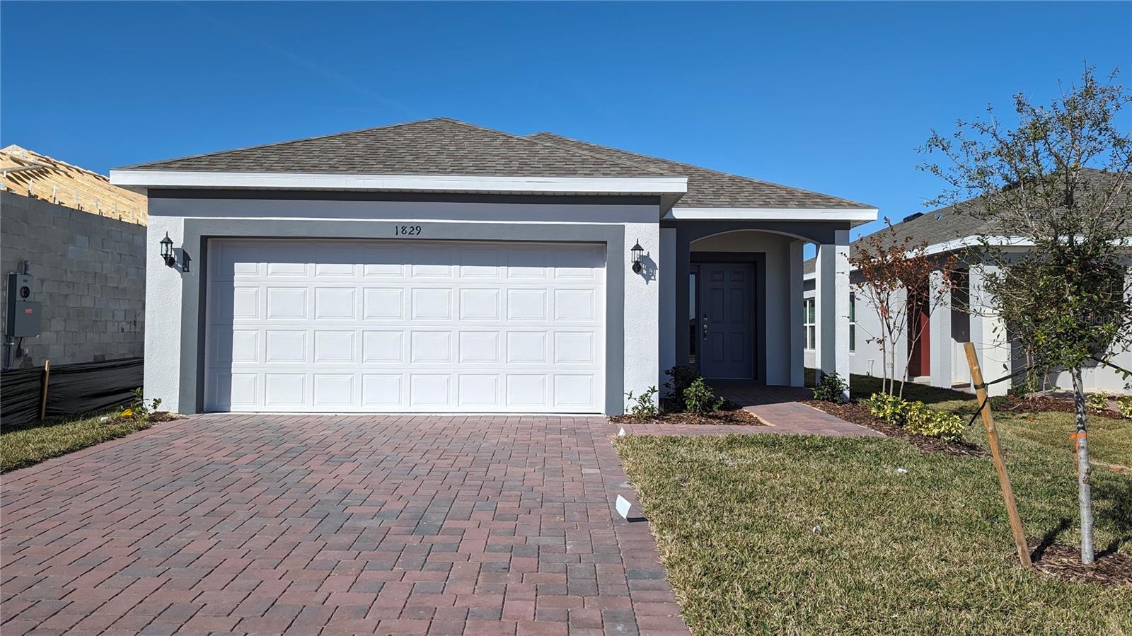 Gorgeous 3 bedroom 2 bath home in the Trinity Lakes Community that just finished construction is now available! Be the first one to live here! The home includes tile throughout the great room with carpeted bedrooms. The modern kitchen boasts plenty of storage space with espresso 42” cabinets, granite countertops and stainless steel appliances. This community loaded with amenities and features like walking trails, a resort style pool and splash pad, playground, fitness center, and clubhouse to enjoy. Ready now and available to move in today!