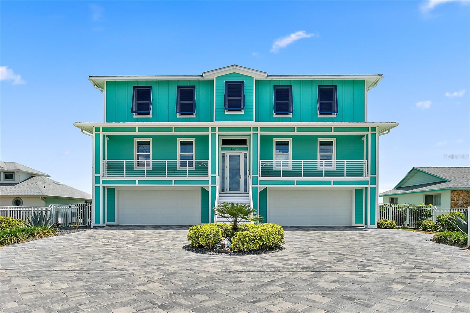 EPIC OCEANFRONT home built in 2021!! Premium construction with SALT and HEATED pool with private walkover to NO DRIVE BEACH! This home has concrete block, all 3 stories up, 6 bedrooms plus 2 flex rooms, 5 baths, 4 CAR GARAGE, and OPEN PLAN with ELEVATOR. Top floor hosts your main living space with grand kitchen. Finished with all WOOD cabinets, QUARTZ countertops with large island, GAS range with GE Monogram series STAINLESS STEEL appliances, kitchen window with views of Ponce Inlet Lighthouse, & huge walk-in pantry with custom organization. Opens onto Dining Room with complete ocean views with large windows looking down the shoreline. Crown molding and TILE plank flooring flows into the Family Room with custom built-ins and sliders out to 3rd story balcony. Master Bedroom is on 3rd floor with private balcony access. Master Bedroom is complete with tile plank flooring, transom windows to let in additional natural light, & large walk-in closet with custom built-ins. Master Bath finished with oversized walk-in TILE shower with rain shower features, 2 sinks with QUARTZ countertops, & custom mirrors. This floor is completed with 6th bedroom, perfect for home office with large walk-in closet and plantation shutters. 1/2 Bath, perfect for guests, with QUARTZ countertops. Oversized laundry room with sink and stop-&-drop area. Ride elevator down to 2nd story set up perfectly! 2 oceanfront bedrooms with access to 2nd story balcony, tile plank floors, and walk-in closets. Bedroom 5 and 6 are both great in size with TILE floors, & walk-in closets. Bathroom 2 has QUARTZ countertop with TILE tub/shower combo. Bedroom 4 also has walk-in closet and bedrooms 4 and 5 share bathroom 3 with TILE walk-in shower. Additional TV/Flex room with 12 ft custom built-in sliders out to lanai, and 2 large storage closets. Head to your bottom floor where it's premium hosting! 1,600 sq ft of entertaining space with full built-in bar area, tile floors, sliders out to lanai, and full bath with access to pool area. Great for home gym and game room! Additional storage room, great for all your beach gear! Through sliders, walk out to your ultimate POOL area! Heated, salt water, 36ft long Pool with endless Atlantic Ocean views. Accented with lighted lamineers, & additional jets. Easy maintenance outdoor space with dog friendly artificial turf and fully fenced yard. Interior is complete with 4 CAR GARAGE with hurricane grade doors and whole house water purification system. This home has so many upgrades including complete motorized HURRICANE SHUTTERS, whole house generator with 500lb buried propane gas tank, IMPACT windows and doors with turtle safe tint, foam insulation with spray foam in between floors, poured concrete in all 3 floors, metal roof coated for beachside living, custom built-ins throughout entire home, tile plank floors throughout, floors 1-3 elevator, Monogram series appliances, all wood/dovetail/soft close cabinets throughout, concrete poured seawall with deep sand dunes, plus so much more! Ask listing agent for full features sheet. Catch all views of Ponce Inlet lighthouse, rocket launches all from balconies, inside home, and on private 12x12 ROOF DECK with 360-degree views! Ponce Inlet is private beach living with locally owned restaurants, residential living, and premium white sand. This coastal comfort home has all the premium finishes and construction anchored right on the Atlantic Ocean!