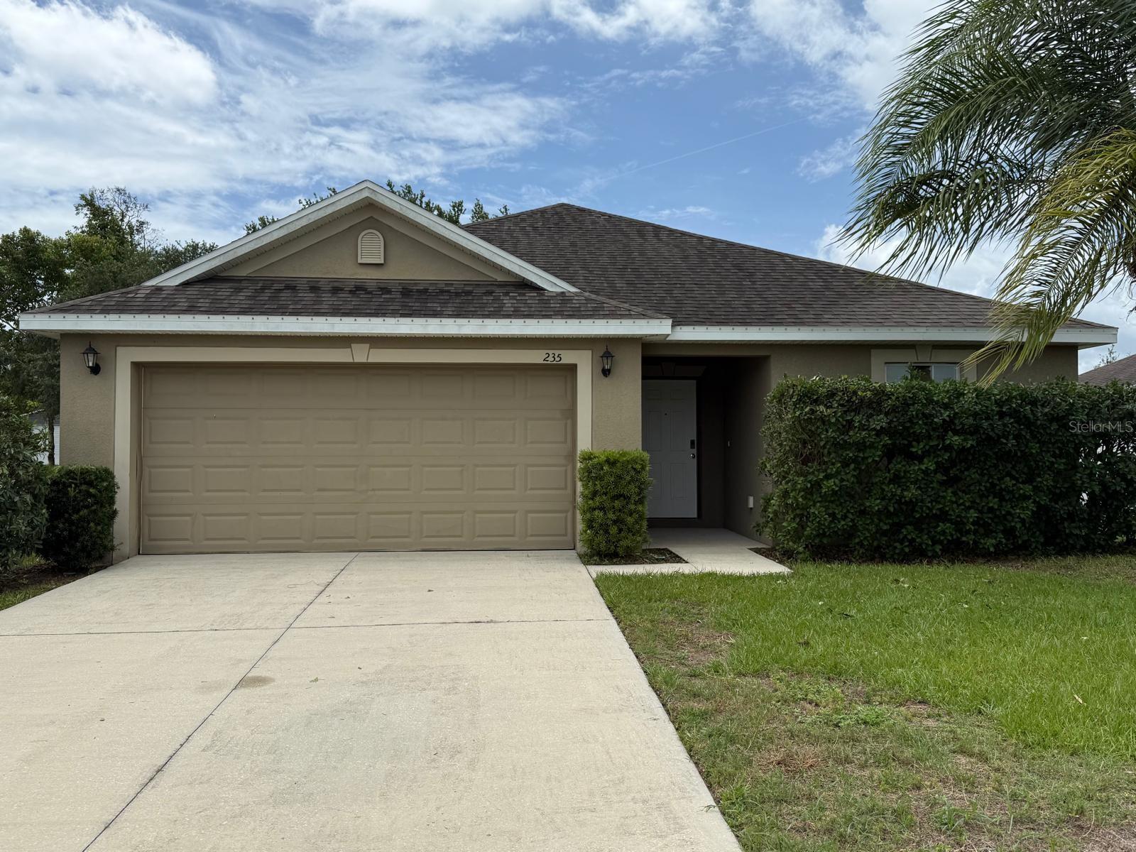 Welcome to this well-maintained 3-bedroom, 2-bath home located in the desirable Lake Alfred Estates community. Built in 2015, this single-story residence offers a functional open-concept layout with spacious living and dining areas, perfect for everyday living and entertaining. The kitchen features ample cabinet space, modern appliances, and a convenient pantry. The primary suite includes a private bath and generous closet space, while two additional bedrooms provide flexibility for family, guests, or a home office. Enjoy the convenience of a 2-car garage, indoor laundry area, and a spacious backyard with room to relax, garden, or entertain. Situated in a growing area of Central Florida with easy access to major highways, shopping, dining, and nearby lakes. Low HOA and move-in ready—don't miss this opportunity to make Lake Alfred your home!