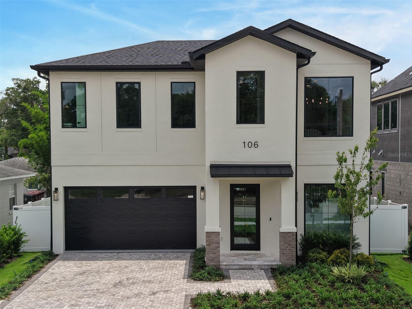 Welcome to 106 King St! A beautifully designed, new construction home, built by LUIH Luxury Homes. Nestled in, College Park and minutes from Winter Park and Lake Ivanhoe. This home is centrally located to entertainment, restaurants, shopping and more. Home offers, 5 bedrooms, 5 full baths, and is 3251sqft of highly designed elegance and functionality. For the chef in the family, the kitchen is equipped with a 36” gas cooktop, wine bar, oversized island, plenty of storage and premium appliances. The first-floor primary suite provides a private retreat with spa-inspired finishes. The open-concept living and dining areas, is perfect for entertaining family and friends. Upstairs, you’ll find three generously sized bedrooms, all with on suite bathrooms and a shared loft area. For your convenience, there are two laundry rooms. One on the first floor, and one located on the second floor, thoughtfully designed to simplify daily routines. Step outside to your private resort-style oasis, complete with a sparkling pool, covered patio, and fully equipped outdoor kitchen, creating the perfect setting to enjoy Florida living year-round. Schedule a showing, and see what this amazing home and community has to offer.