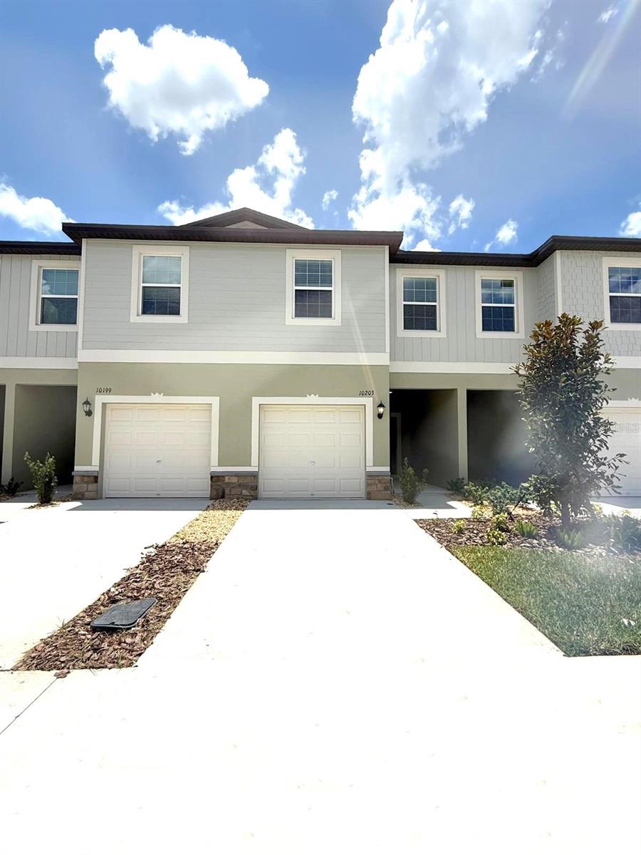 Discover this like a brand new, two-story townhome in the heart of the vibrant Mirada community in San Antonio, FL. This 3-bedroom, 2.5-bathroom residence with a one-car garage offers a fresh, modern design perfect for comfortable living and entertaining. Inside, enjoy a spacious open-concept main floor featuring a stylish living room, dining area, and kitchen with a sleek half bath and ceramic tile flooring. Upstairs, you'll find all three bedrooms conveniently located on the second floor, including the laundry area with washer and dryer included—a major convenience that comes with this home. As a resident of Mirada, you'll receive full, year-round access to the 15-acre man-made crystal lagoon, offering a true beach-style experience right in your community. Enjoy swimming, kayaking, paddleboarding, and lounging by the water just steps from your front door. Community Amenities Include: Resort-style pool Multiple dog parks Tennis and pickleball courts Golf cart paths Walking and biking trails Playgrounds, bocce ball courts, and more ULTRAFi high-speed internet included in rent for top-tier connectivity -> Pet Policy: Dogs and cats allowed. Limit 2 pets, 25 lbs max. -> Rental Requirement: Minimum 600+ credit score required to apply. This move-in-ready townhome offers low-maintenance living with exceptional amenities in one of the most exciting new communities in Florida. Don’t miss your chance—schedule your tour today!