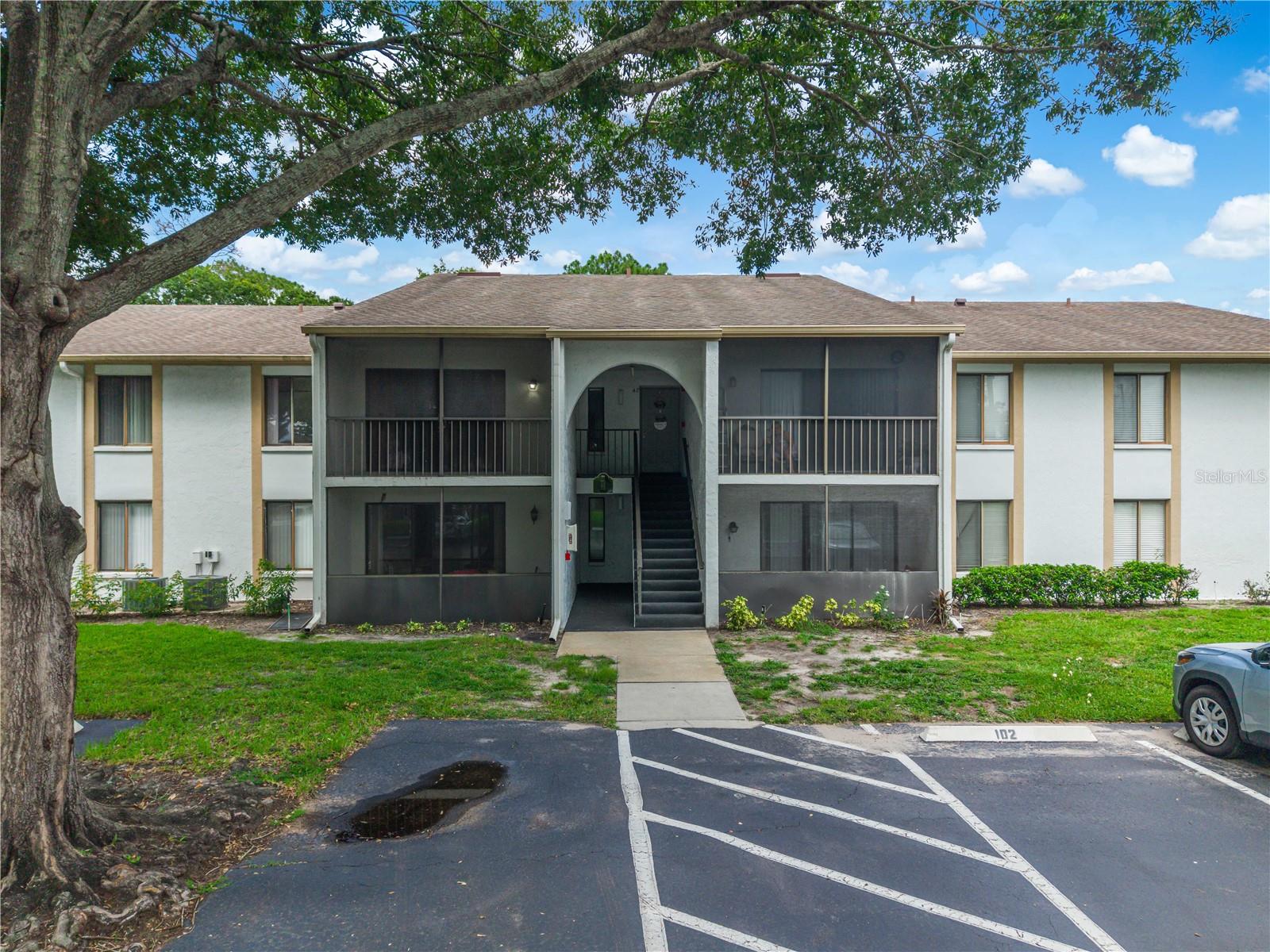 Welcome to 8201 Sun Spring Circle #C2, a beautifully updated 2 bedroom, 2 bathroom condo located in a desirable gated community in East Orlando. Whether you're a first time homebuyer, downsizing, or looking for an excellent investment opportunity, this move in ready home offers comfort, convenience, and modern updates throughout. Step inside to find new white tile flooring throughout with no carpet, creating a bright and contemporary feel. The home also features newer interior paint, has been completely re piped, and boasts fully renovated bathrooms with stylish finishes. The spacious layout includes volume ceilings, an inside laundry area, and a screen enclosed balcony, providing the perfect place to relax and enjoy Florida's beautiful weather. The HOA offers exceptional value by including water, internet, cable, trash service, and exterior maintenance, allowing for truly low maintenance living. Conveniently located just minutes from Valencia College East Campus, UCF, shopping, dining, and major roadways including SR 408, SR 417, and SR 50, you'll also enjoy easy access to Downtown Orlando, Orlando International Airport, and Central Florida's world renowned attractions. Whether you're searching for your next home or a smart investment, this beautifully updated condo is one you won?t want to miss. Schedule your private showing today!