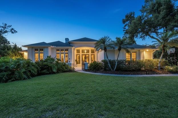 Set in the enchanting, tree-canopied gated community of Bent Tree – The Woodlands, find Modern Elegance in this 4-bed, 3.5-bath 
Athur Rutenberg home sitting on a rare Estate size 0.70-acre pond-view lot. The mature trees and natural landscape create a peaceful, almost magical arrival.

Beautifully updated throughout, the home features large wood-look tile, Cambria quartz, a brand-new kitchen, Crown molding, plantation shutters, updated baths and major improvements including roof, AC, and hot water heater (approx. 6 years).

The outdoor living space is exceptional, offering a beautiful over-sized, Salt water, Heated, pool and spa framed by a picture-window cage overlooking the serene pond and lush greenery. 

The location is outstanding — close to beaches, shopping, restaurants, and everyday conveniences — making this property a rare blend of privacy, elegance, and Sarasota lifestyle. The perfect home for someone who does not like cookie cutter homes and loves nature.  Come take a look. Seller will leave the large potted plants for the new buyer to enjoy.