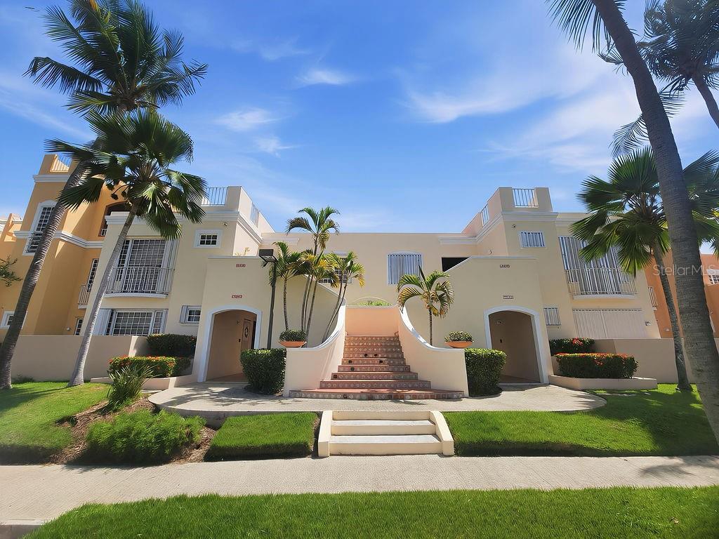 Second Floor, fully furnished condominium located in the desirable Fairway Courts community within Palmas del Mar. This turnkey residence offers a spacious and functional layout with serene views of lush tropical landscaping and a tranquil waterfall, creating a peaceful resort-style ambiance. The unit provides convenient ground-level access and is ideally situated near golf courses, beaches, tennis facilities, dining, and all amenities Palmas del Mar has. Well suited as a primary residence, vacation home, or income-producing rental property. Excellent investment opportunity in one of Puerto Rico’s most sought-after resort communities.