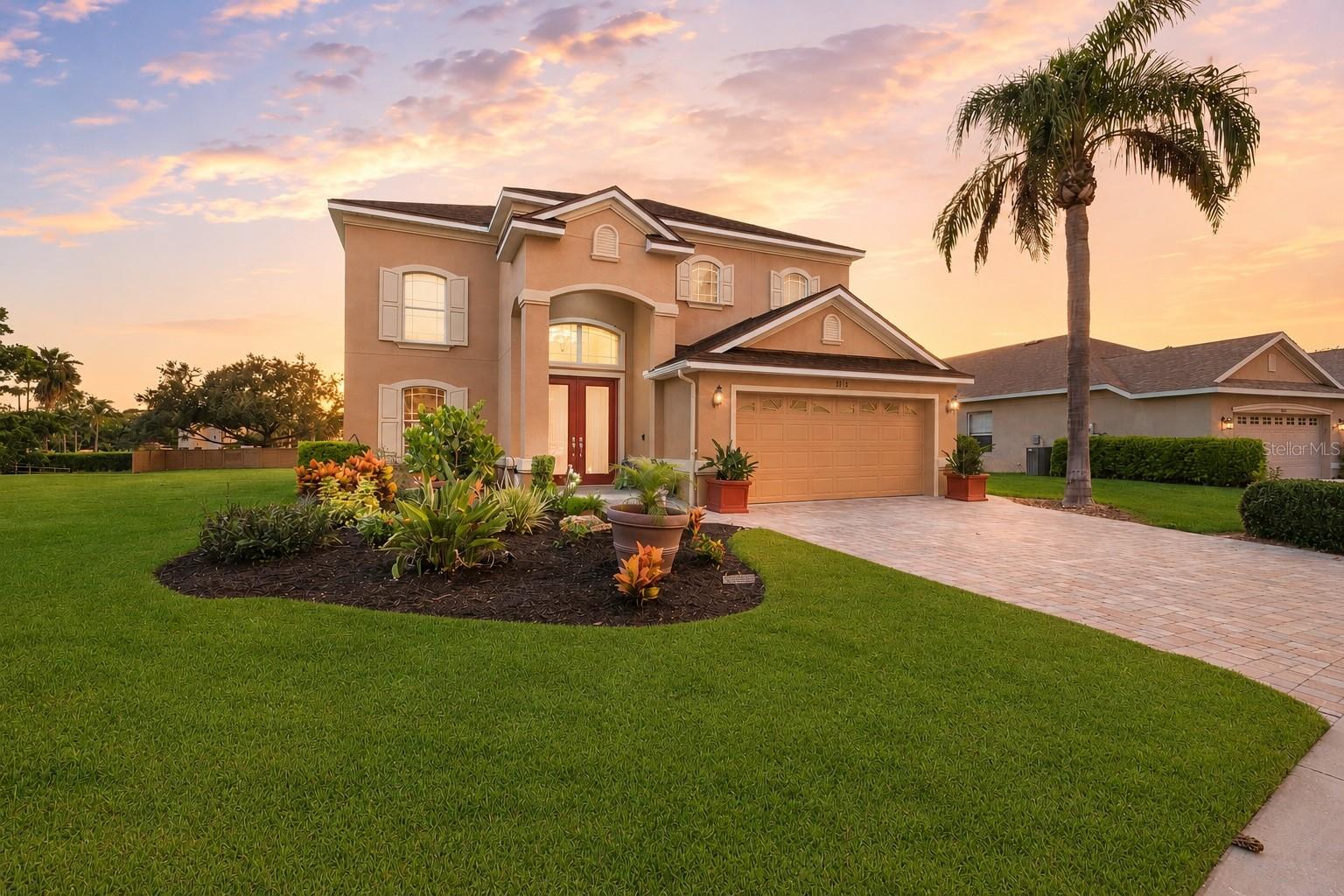 Virtually Staged. Welcome to Palma Sola Trace, one of the area’s most desirable coastal communities, where resort-style amenities, a prime location, and the laid-back Gulf Coast lifestyle come together seamlessly. Perfectly positioned just minutes from the sugar sand beaches of Anna Maria Island, this community places you right in the heart of everything locals love most about the area. Spend weekends enjoying waterfront restaurants, boating, fishing, beach days, and breathtaking sunsets, all while still having the convenience of shopping, dining, coffee shops, and everyday essentials just around the corner.

Outdoor enthusiasts will especially appreciate being located within approximately two miles of the Palma Sola Causeway, a local favorite for kayaking, paddleboarding, jet skiing, horseback riding along the water, picnics under the pavilions, and launching into some of the area’s best coastal adventures. Nearby Robinson Preserve and Neal Preserve offer additional scenic walking trails, wildlife views, and waterfront nature preserves that make this area so special. This location also provides easy access to IMG Academy, multiple golf courses, downtown Bradenton Riverwalk, and nearby Sarasota with its vibrant arts, dining, and entertainment scene. Residents of Palma Sola Trace enjoy a low-maintenance lifestyle with beautifully maintained grounds, a resort-style community pool, clubhouse, fitness center, and playground, creating the perfect blend of relaxation and convenience.

Pool homes in Palma Sola Trace rarely hit the market, making this a unique opportunity to own one of the community’s larger and more sought-after properties.

Situated on nearly a quarter-acre, this beautifully maintained two-story, five-bedroom POOL home offers over 3,000 square feet of freshly painted, thoughtfully updated living space. A pavered driveway and walkway lead to a grand two-story entry, opening to an airy, open-concept layout with tile flooring throughout the main living areas. The living room features a tray ceiling and new ceiling fan, while the updated kitchen shines with brand-new appliances, granite countertops, and classic subway tile backsplash. With both an eat-in kitchen and a formal dining area, entertaining is effortless.

The first-floor owner’s suite is a true retreat with hardwood floors, tray ceiling, dual walk-in closets, and a spa-inspired ensuite featuring dual vanities, a glass-enclosed shower, soaking tub, and private water closet. A second bedroom on the main level, currently used as an office, offers flexibility for guests or multi-generational living, along with a convenient half bath. Upstairs, three additional bedrooms with new ceiling fans share a full bath.

Outside, sliding glass doors lead to a private screened lanai overlooking an oversized heated saltwater pool and spa, complete with a safety gate and brand-new screen enclosure. Recent upgrades include a new roof, two new AC systems with transferable warranties, and a whole-house reverse osmosis system. Located in a no-flood zone, flood insurance is not required. Combining an unbeatable location, spacious layout, major updates, and access to some of the Gulf Coast’s most loved destinations, this home delivers the very best of Florida living.
