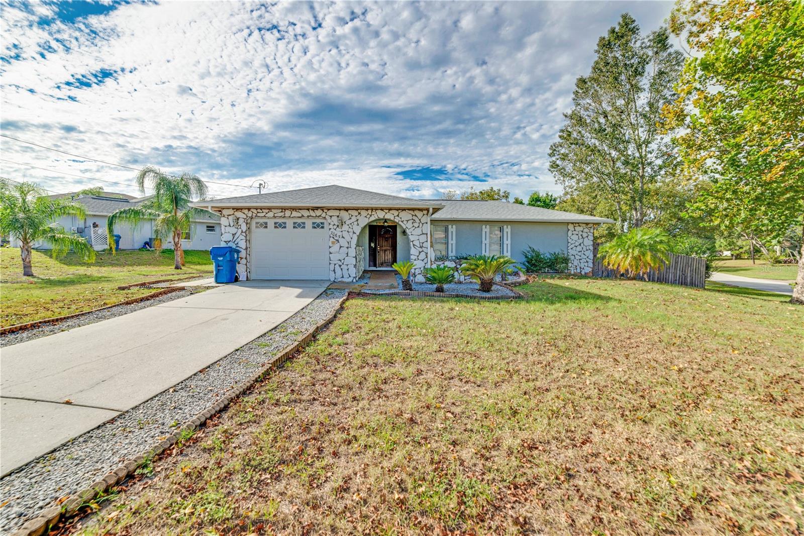 Nestled in the charming neighborhood of Spring Hill presents an inviting 2-bedroom, 2-bathroom home with a delightful outdoor oasis. This cozy residence offers a comfortable living space, featuring a clean and well-maintained interior. The highlight of this property is the refreshing pool, offering a perfect escape from the Florida sun. A cozy jacuzzi complements the outdoor space, providing relaxation and tranquility. With limited inventory in the immediate area, this property will not last.