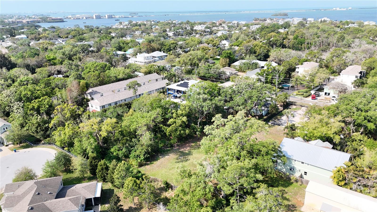 Don’t just build a home, build your future, right here in Ozona! One of Pinellas County’s most desirable coastal communities. This cleared and level vacant lot offers a rare opportunity to fast track your build on a homesite in the heart of downtown. The Lot is 150ft deep by 57ft wide. Location is everything here! There are two home-sites available adjacent to one another offering flexibility for a variety of possibilities, a luxurious single family residence, multi-generational living, income producing rental, the possibilities are plenty. Zoned R-4 allowing for single family residential, duplex, triplex dwellings. 

The “Ozonian” lifestyle is highly regarded, and a lifestyle few have the opportunity to be a part of. Don't let this opportunity slip away. Whether it be the sunset golf cart rides(Golf Cart friendly Community), the access to several local marinas, waterfront dining, the local bars & restaurants, ballgames at Sunderman Sports Complex, walks & bike rides down The Pinellas Trail, or just the tight knit community that keeps an eye out for one another. You can’t beat the close proximity to top rated schools in Ozona Elementary, and Palm Harbor University High School. 
There are two lots available, adjacent to one another. Survey and Site plans available. This lot has been cleared. 
See Adjacent Listing: 290 Orange Street(TB8490514) Seller prefers to sell both lots together. Don’t Just Live, Live Coastal!