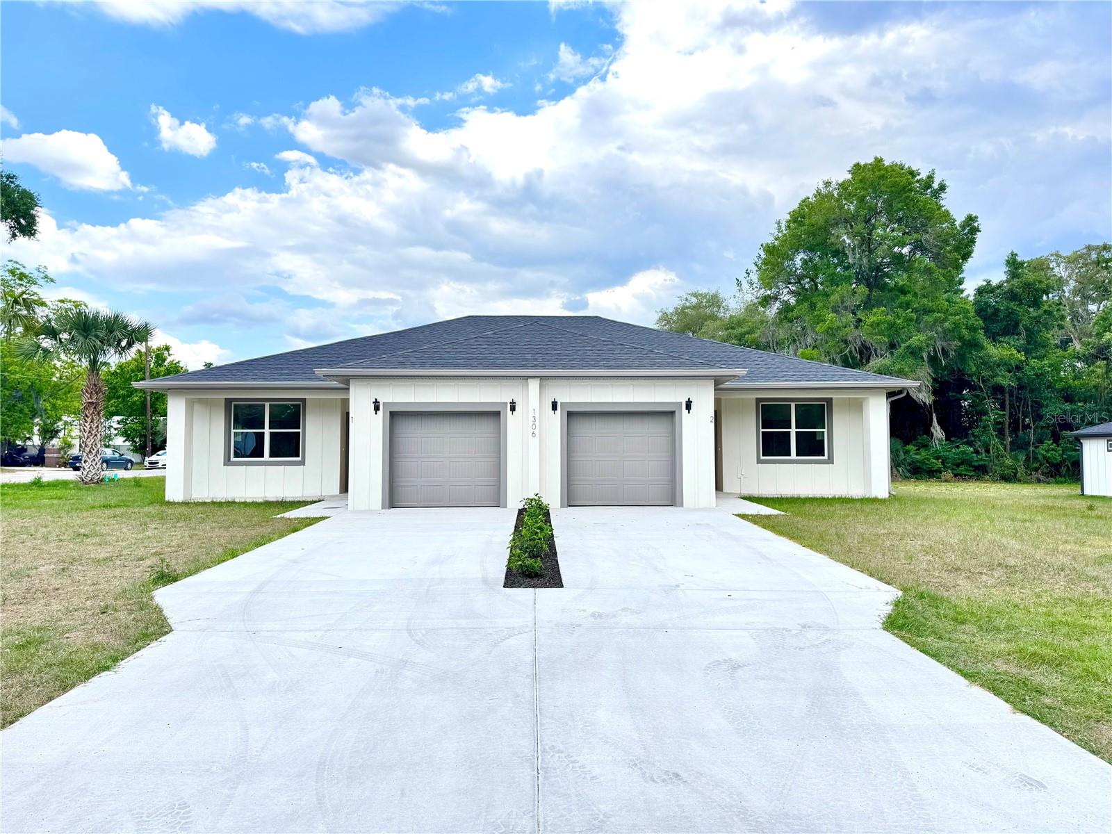 Brand-New Construction Duplex | Income-Producing Opportunity | 2026

Exceptional opportunity to own a newly built duplex in growing Ocala, Florida — perfect for investors, multi-generational living, or owner-occupants looking to offset their mortgage by living in one unit and renting the other.

Each thoughtfully designed unit features 2 bedrooms and 2 full bathrooms with upscale modern finishes and functional open-concept living spaces. High ceilings and recessed lighting throughout create a bright, airy atmosphere, while contemporary finishes add both style and durability.

The kitchens are designed to impress with quartz countertops, shaker-style cabinetry, pantry storage, and ample prep space. Spacious primary suites include elegant walk-in curbless showers, modern vanities, and stylish tile finishes. Both units also include in-unit laundry for everyday convenience.

Built with accessibility in mind, each unit includes ramp access at the entrances and garage, providing added ease and flexibility for a variety of living needs.

Enjoy outdoor living with covered front and rear porches, plus the convenience of a private 1-car garage for each unit.

As a brand-new construction property, buyers will appreciate the peace of mind that comes with all-new systems, energy-efficient features, low-maintenance ownership, and a 1-2-10 builder warranty backed by a trusted local builder.

Whether you’re looking to expand your investment portfolio, generate rental income, or take advantage of a house-hacking opportunity, this turnkey duplex offers strong long-term potential in one of Central Florida’s fastest-growing areas.

NOTE: Furniture is not included.  The owner is a licensed Realtor. 
Room sizes are approximate, it is the responsibility of the Buyer to verify room measurements