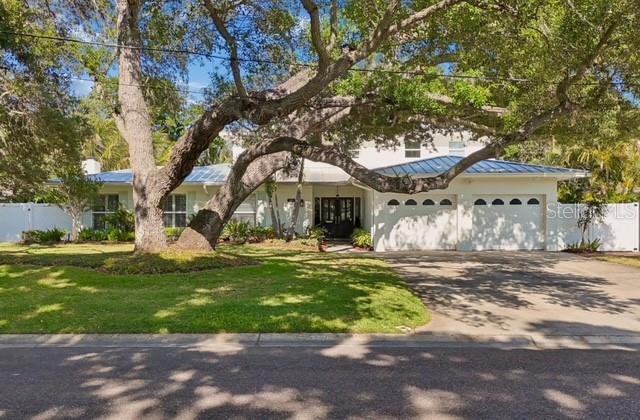Rare opportunity in beautiful Snell Isle! Situated on a unique and highly desirable 90-foot waterfront lot, this 4 bedroom 3.5 bath well-maintained home offers nearly 3,400 square feet in one of St. Petersburg’s most sought-after neighborhoods, just moments from the Vinoy Golf Course.  In a market where many waterfront opportunities are tear-downs or new custom builds, this property presents an exceptional chance to enjoy a spacious waterfront home at a compelling price point.

Designed with both everyday living and entertaining in mind, the home features a semi-open floor plan with generous living spaces, including a formal dining room, dedicated office, and a separate family/bonus room with closing doors—ideal for families, guests, playroom, or media space. The layout lives large and offers flexibility that is hard to find.  A pool bath adds convenience for indoor-outdoor living, and the oversized garage provides excellent storage.  Additional peace of mind comes from the 2021 metal roof.

Outside, the property truly shines. The backyard offers a huge grassy area, fully fenced for privacy and peace of mind, along with mature, beautifully maintained landscaping, coconut palms, and majestic oak trees that provide wonderful shade—plus two mature oaks in the front yard that add to the home’s character and curb appeal. The outdoor living experience has been extensively enhanced with a gorgeous 2022 custom Sekas pool and spa, 2022 travertine pavers, PLUS a well-appointed outdoor kitchen with a private setting for relaxation and entertaining.

Boaters will appreciate the 2022 dock and the 2022 16,000-pound Neptune lift, along with 90 feet of protected waterfront and views extending toward Smacks Bayou.   Just minutes to to Tampa Bay for world class boating and fishing!   Year round enjoyment with stunning water views.  Watch amazing sunrises as you sip your morning coffee.  

This is your opportunity to own a sizable waterfront home on an exceptional lot in Snell Isle—offering space, function, privacy, and outdoor enjoyment in a location where opportunities like this are increasingly hard to find.  Take your golf cart to nearby the Vinoy Golf course and club, Crisp Park, Whole Foods, or neighborhood schools.  Just minutes to St Pete's vibrant downtown restaurants, museums, entertainment, and boutique shopping.   This is Florida Coastal Living at it's best!  Listing agent is related to Seller.  All square footage and measurements are approximate and not guaranteed.  Buyer to verify all information. Taxes subject to change.